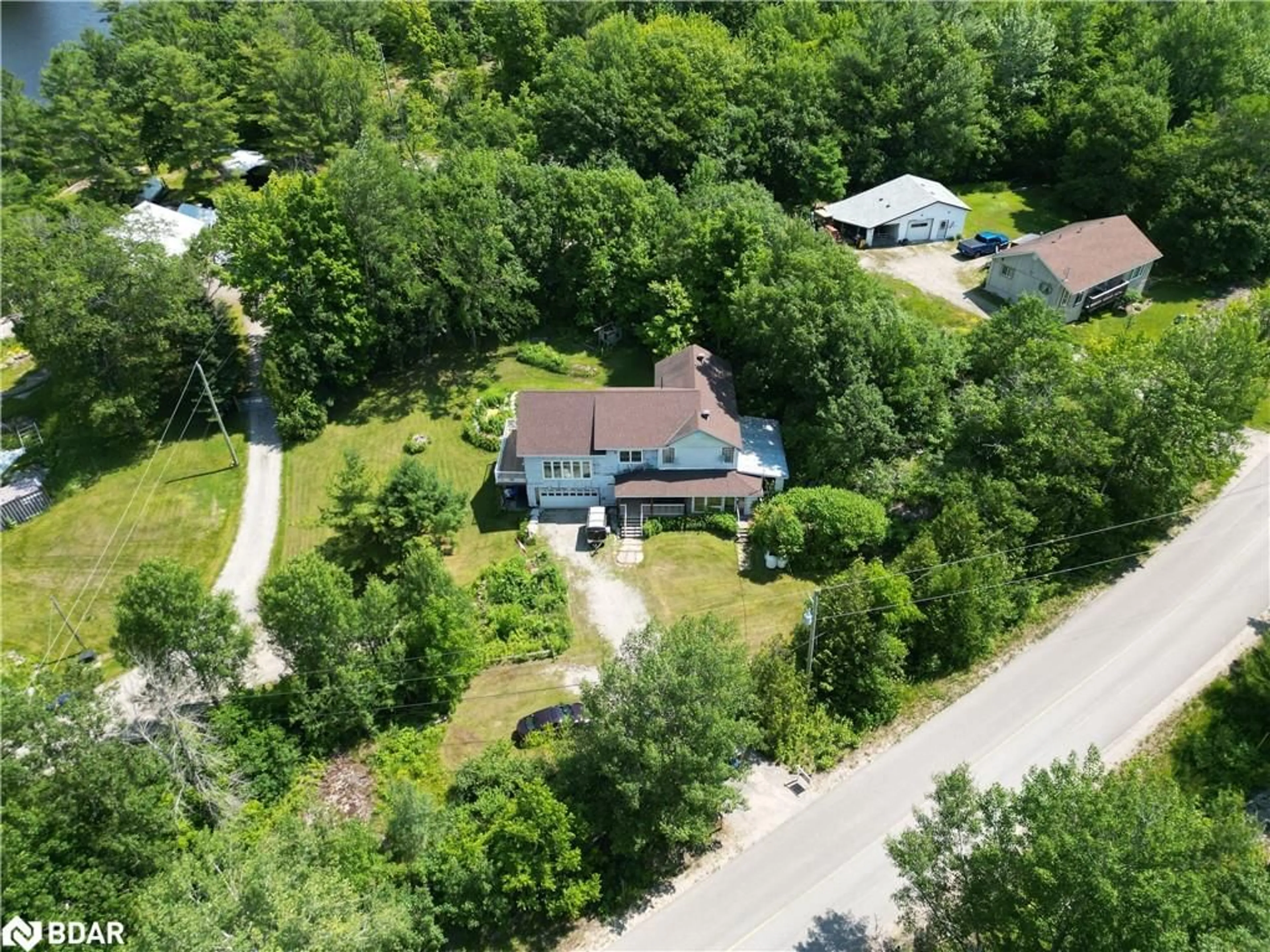 A pic from outside/outdoor area/front of a property/back of a property/a pic from drone, street for 1894 Henrys Landing Landng, Coldwater Ontario L0K 1E0