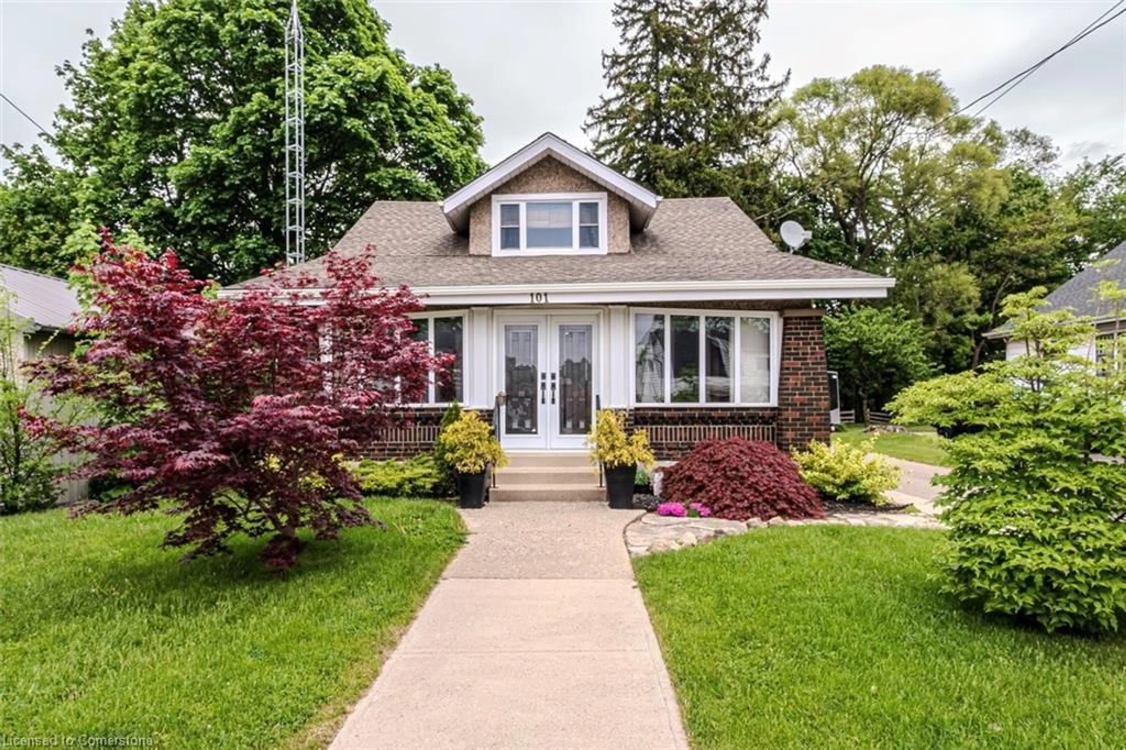 Home with vinyl exterior material, street for 101 Talbot Rd, Delhi Ontario N4B 1Z7