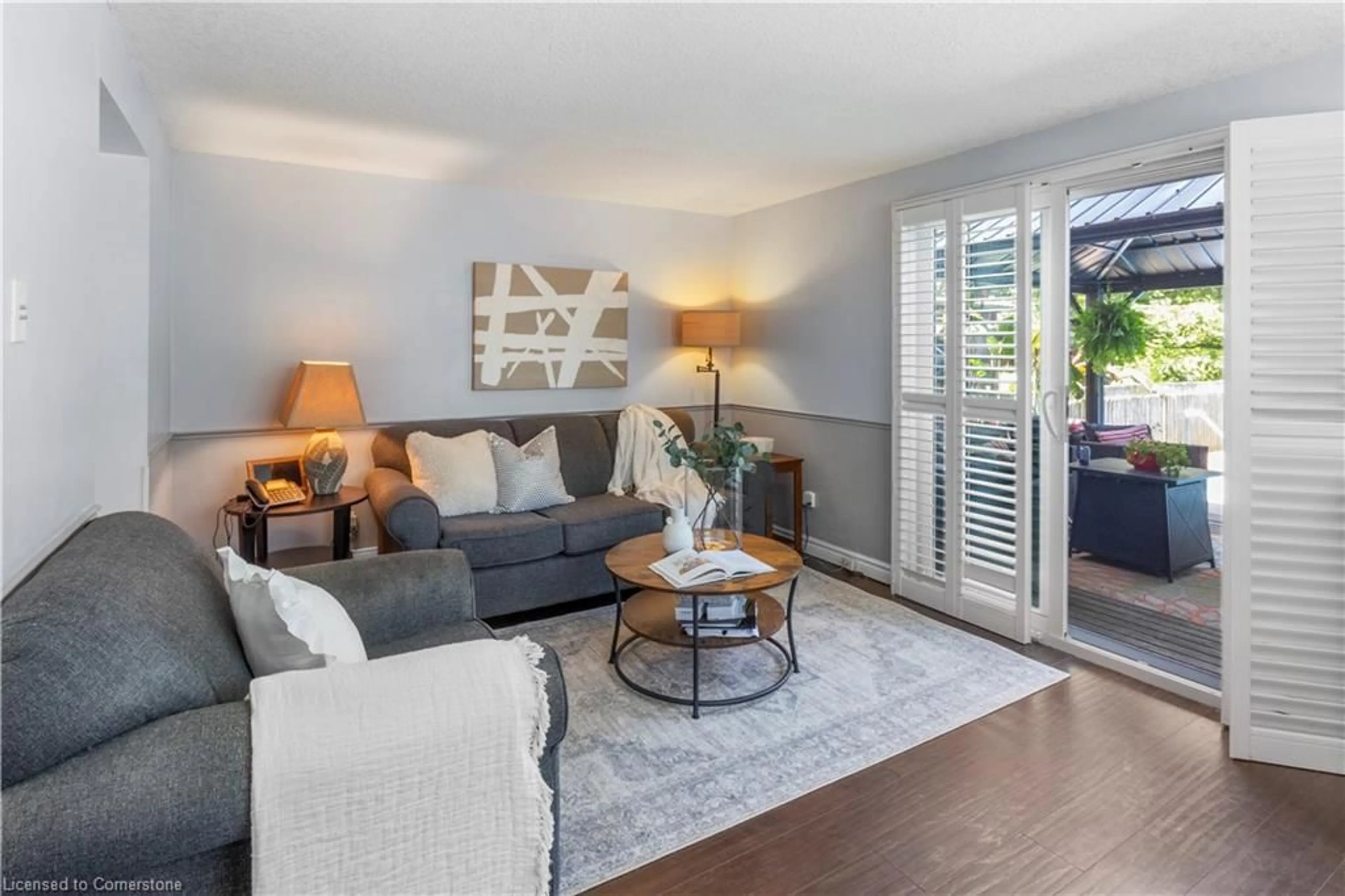 Living room with furniture, wood/laminate floor for 46 Rosebank Cres, Kitchener Ontario N2E 2R4