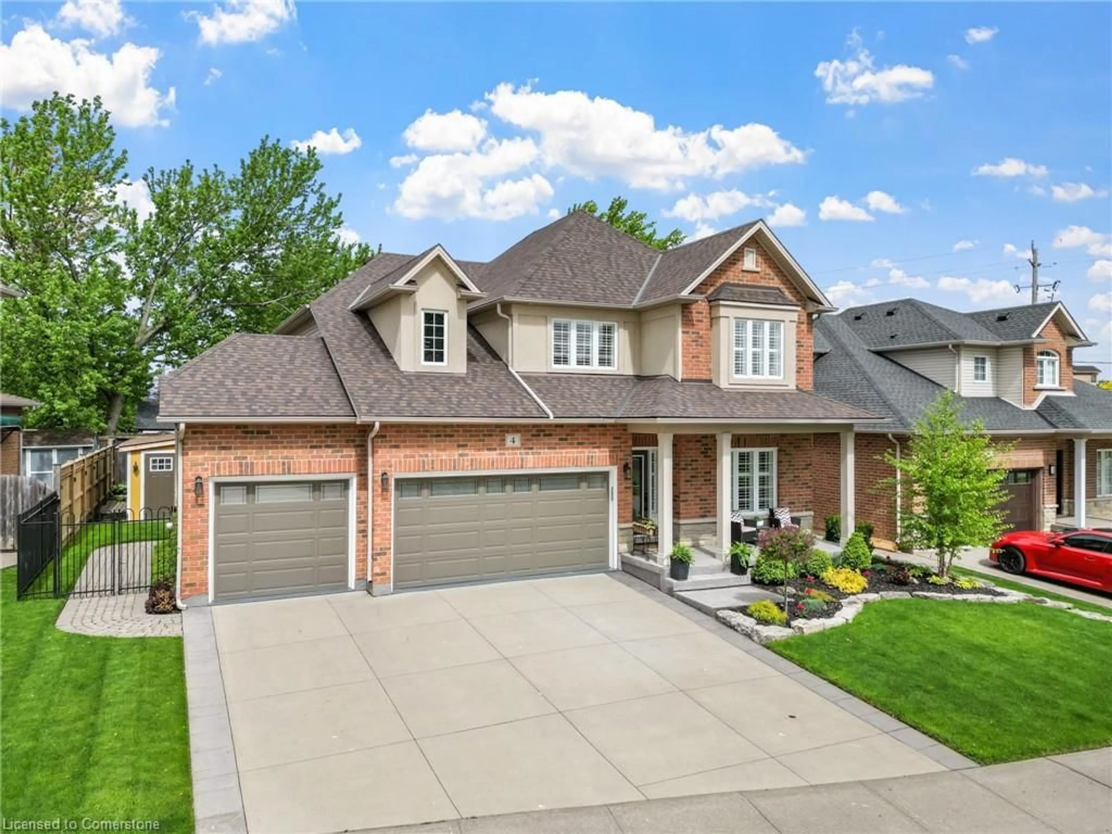Home with brick exterior material, street for 4 Golf Woods Dr, Grimsby Ontario L3M 5P5