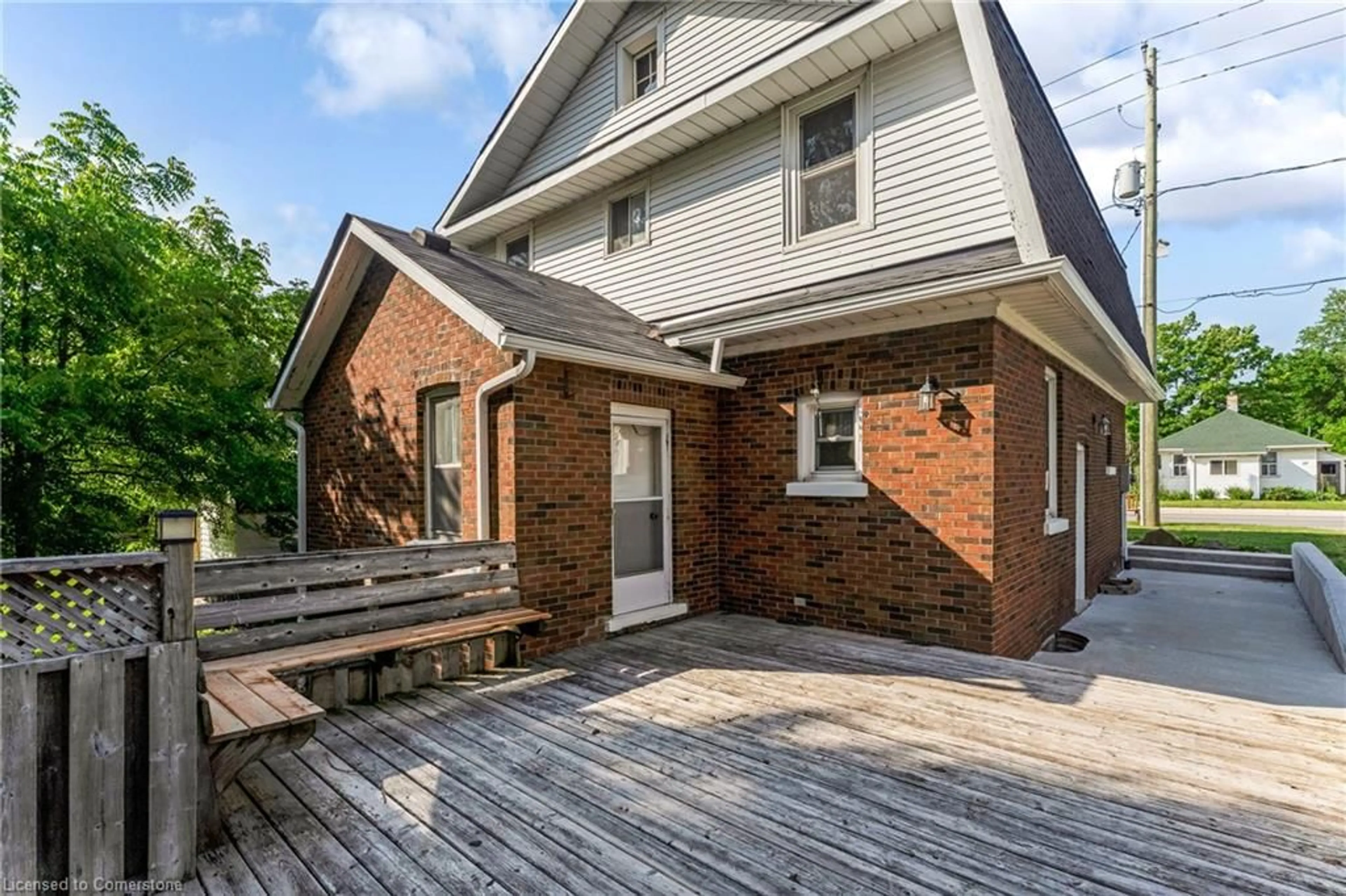 Home with brick exterior material, street for 200 Elora St, Harriston Ontario N0G 1Z0