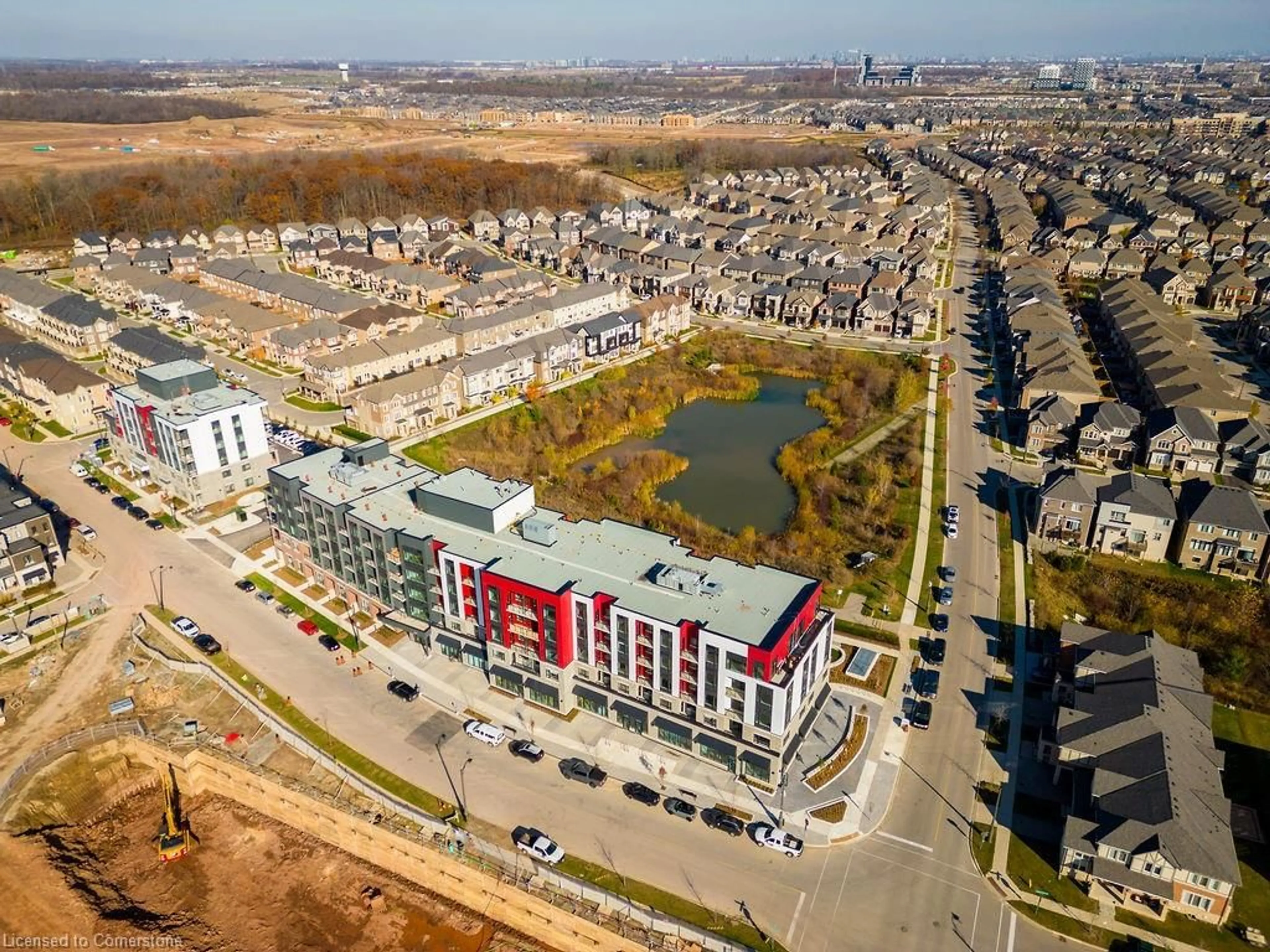A pic from outside/outdoor area/front of a property/back of a property/a pic from drone, city buildings view from balcony for 3265 Carding Mill Trail #205, Oakville Ontario L6M 5P7