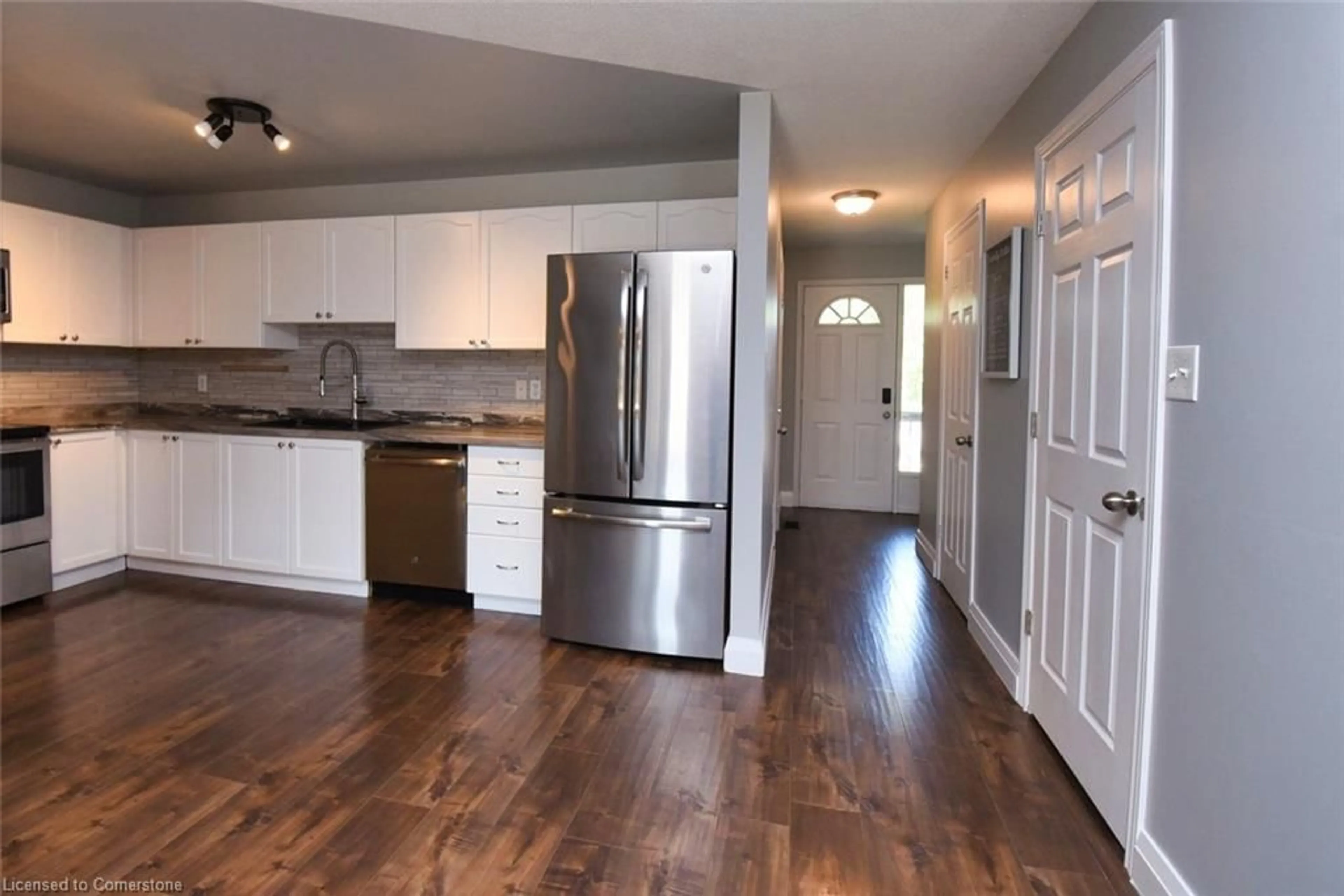 Open concept kitchen, wood/laminate floor for 4874 John St, Beamsville Ontario L0R 1B6