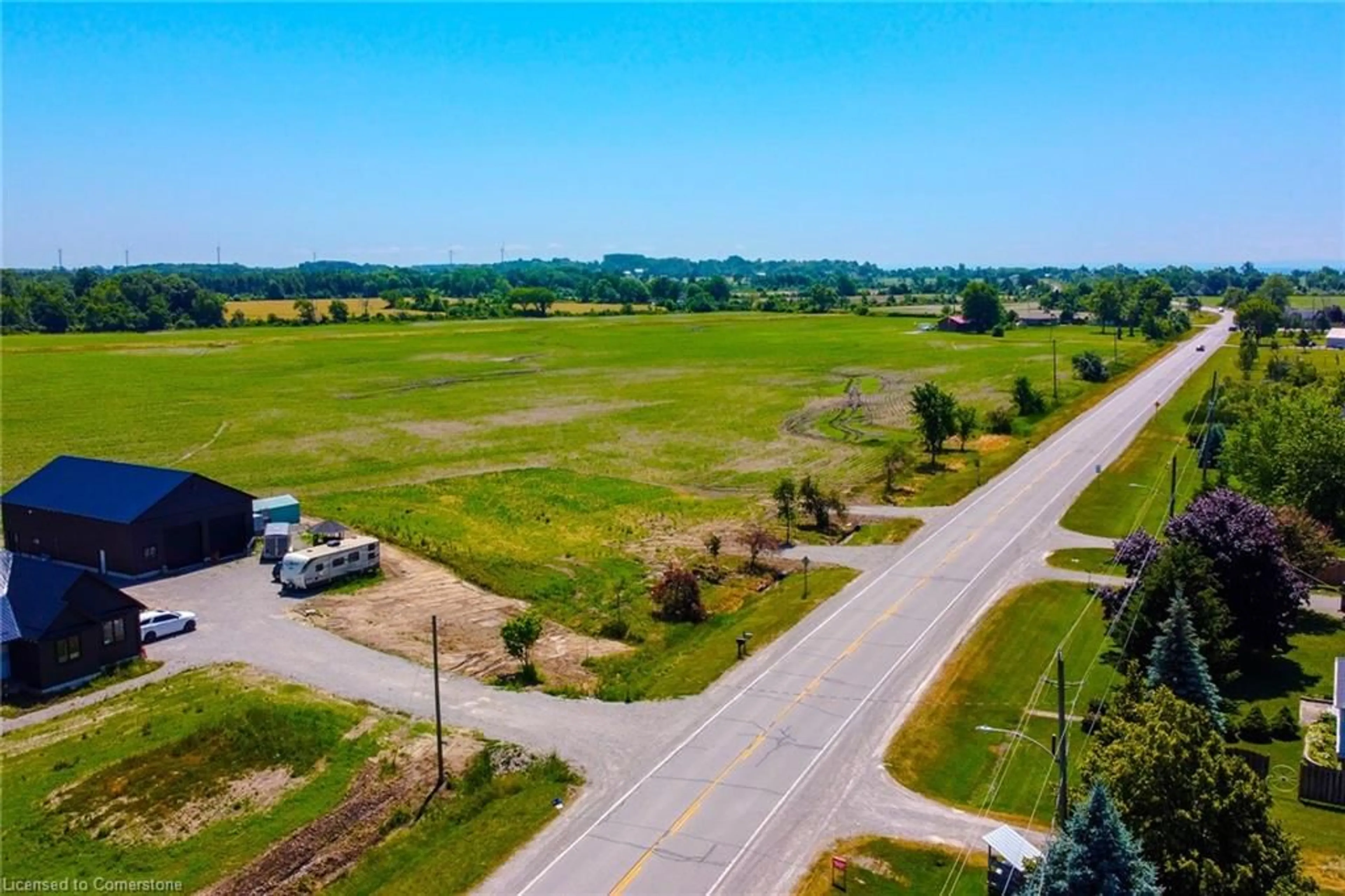 A pic from outside/outdoor area/front of a property/back of a property/a pic from drone, street for 1609 North Shore Dr, Lowbanks Ontario N0A 1K0