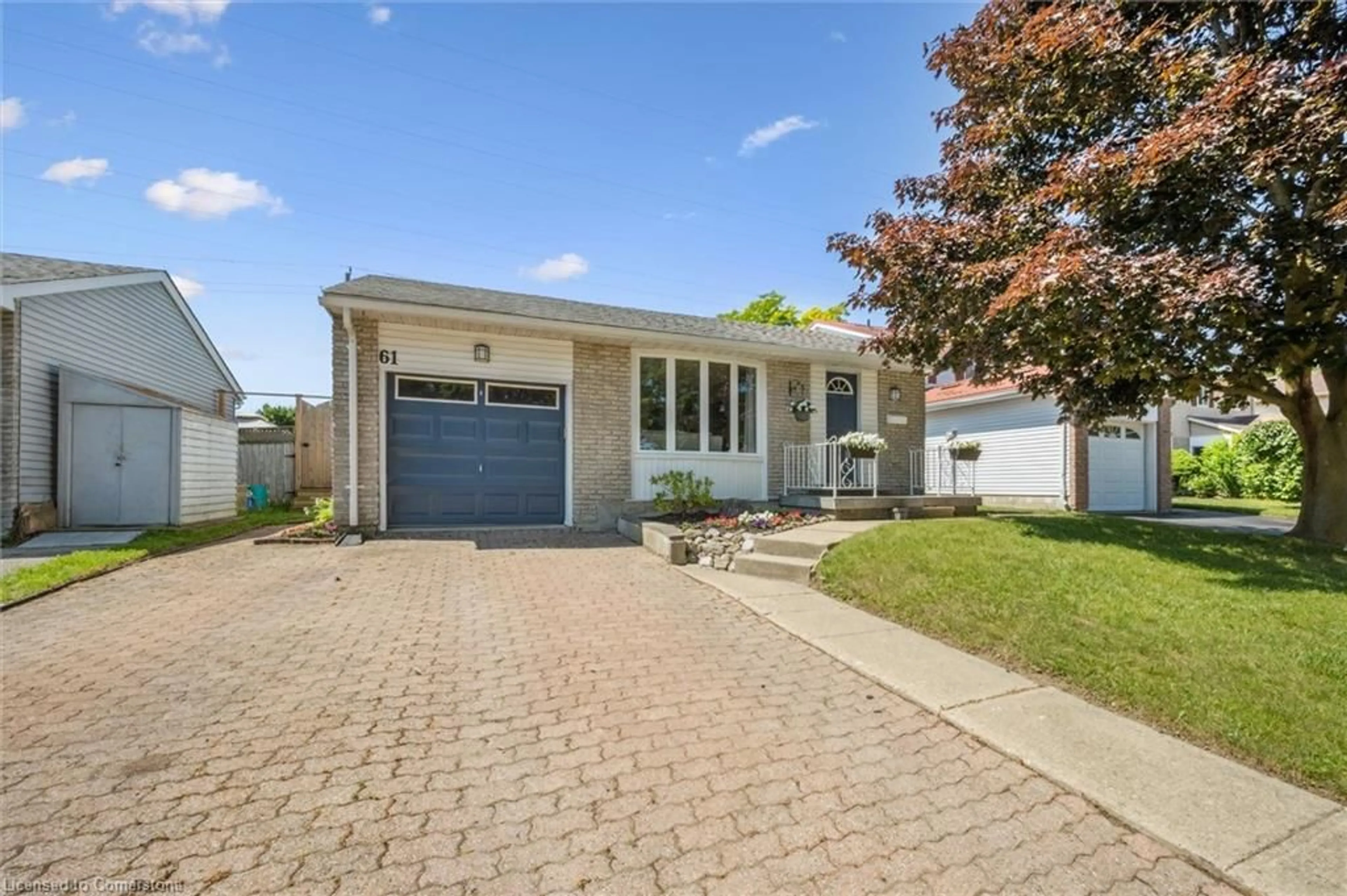 Home with vinyl exterior material, street for 61 Rolling Meadows Dr, Kitchener Ontario N2N 1T4