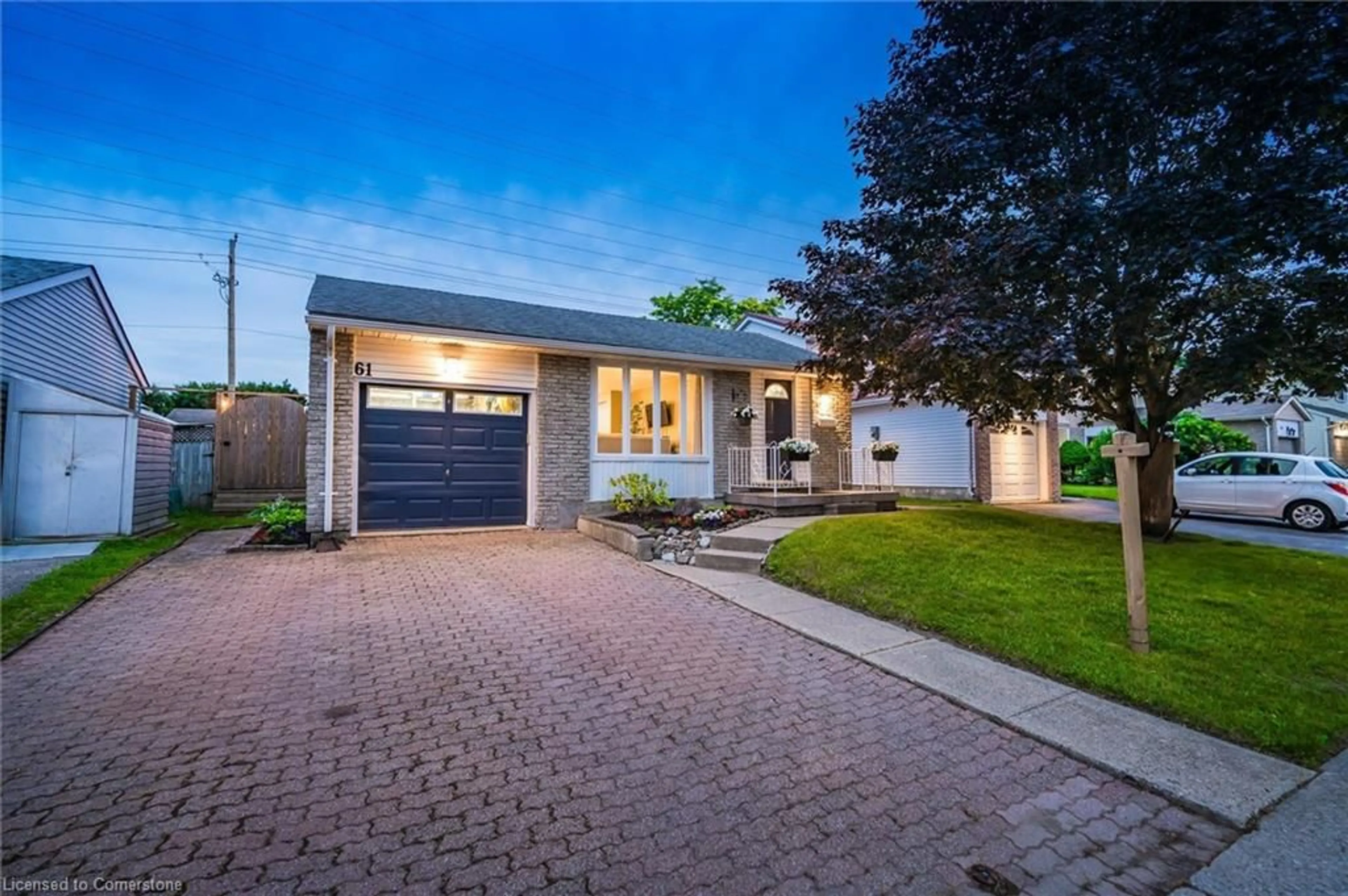 Home with brick exterior material, street for 61 Rolling Meadows Dr, Kitchener Ontario N2N 1T4