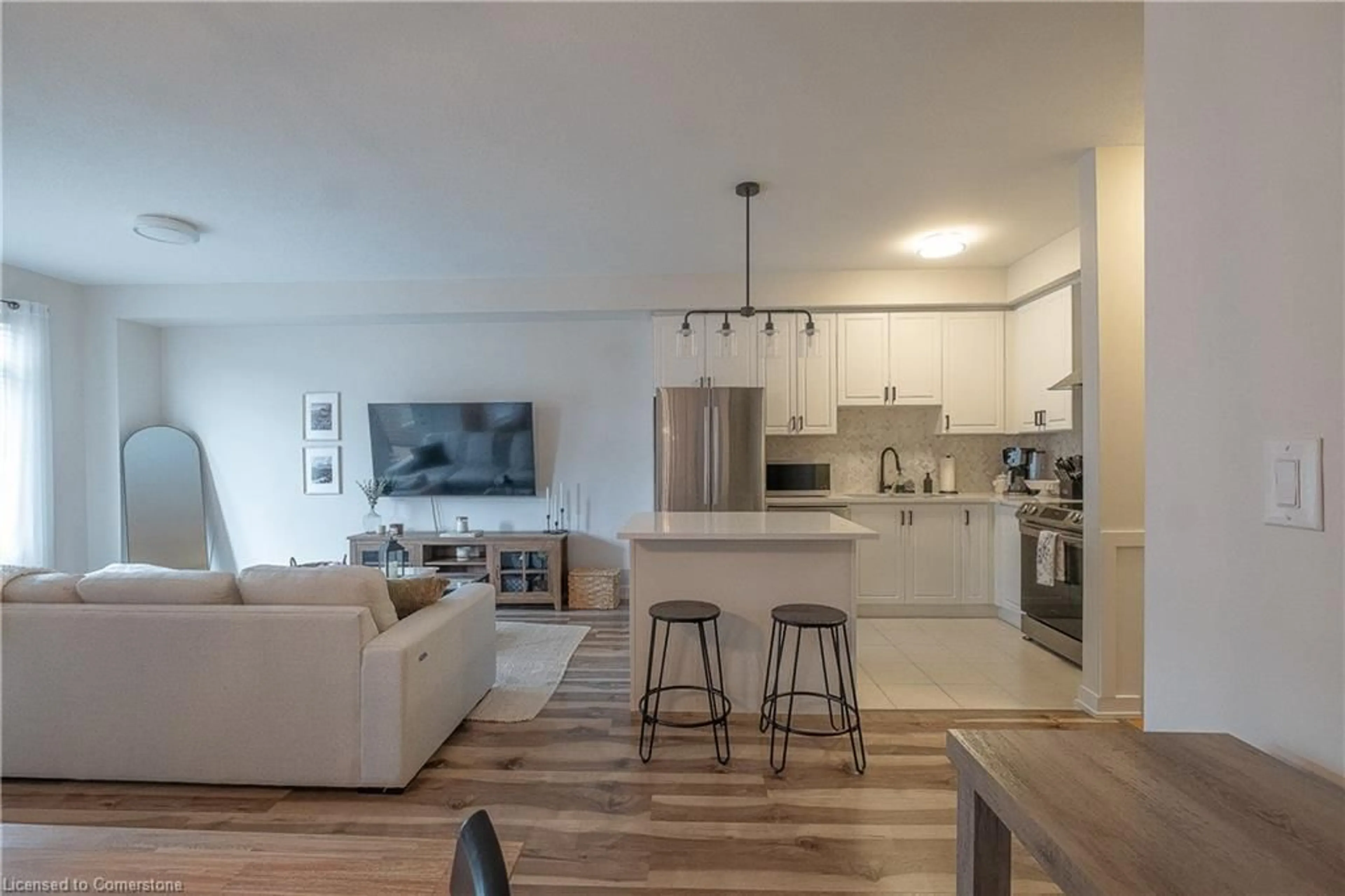 Open concept kitchen, wood/laminate floor for 590 North Service Rd #127, Stoney Creek Ontario L8E 0K5