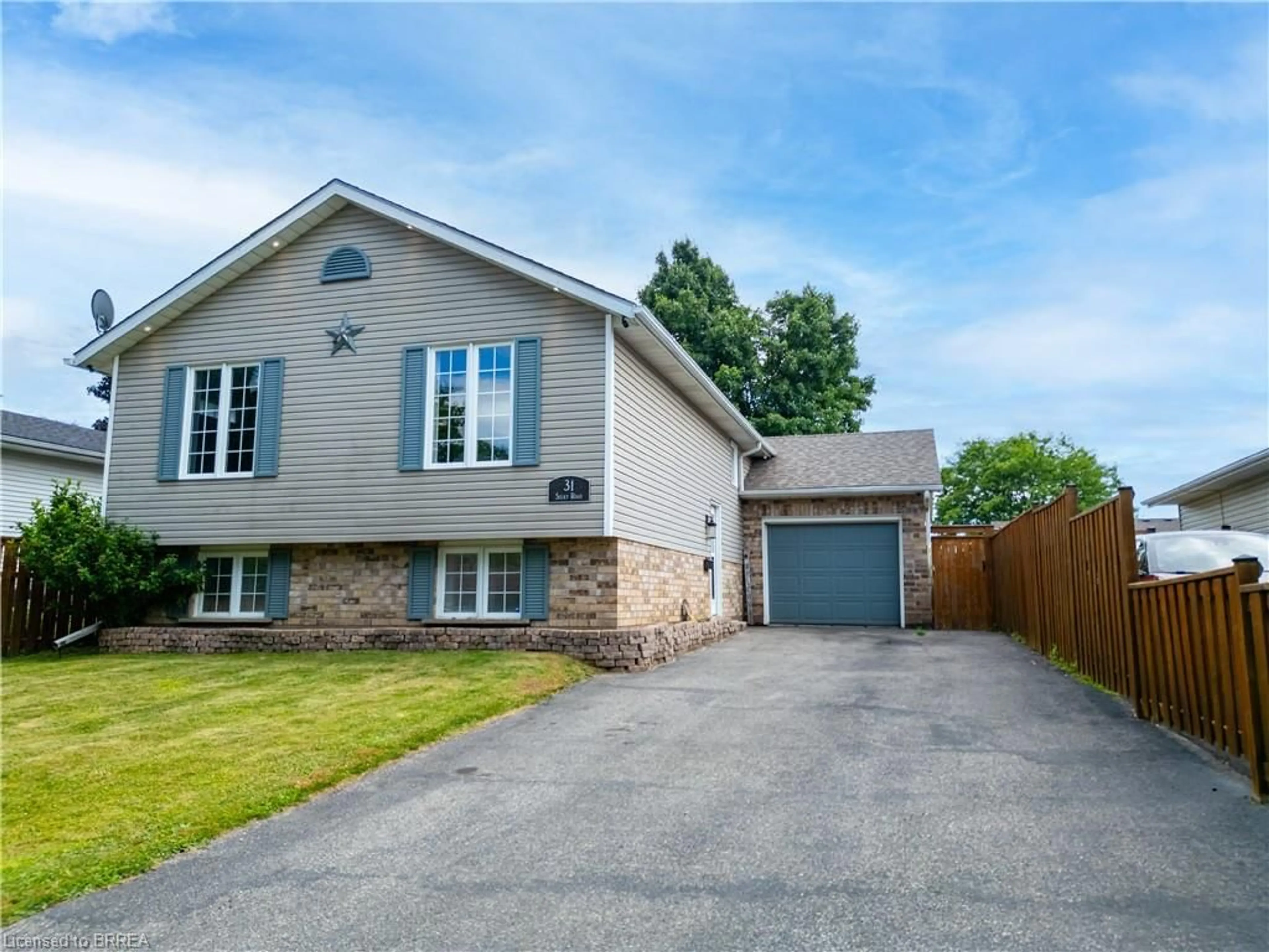 Home with brick exterior material, street for 31 Sulky Rd, Brantford Ontario N3P 1K1