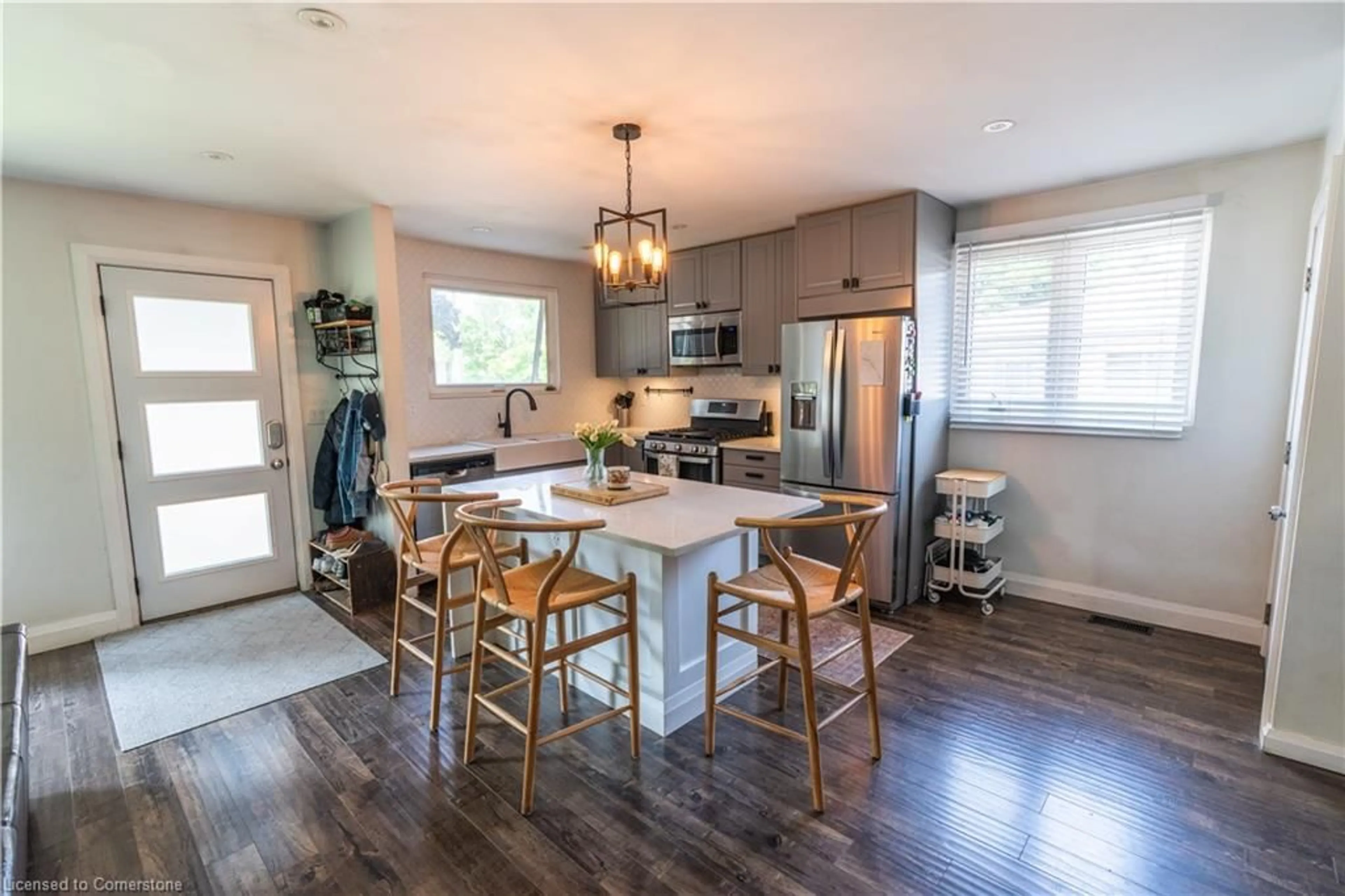Open concept kitchen, wood/laminate floor for 16 Boston Cres, Hamilton Ontario L8T 4N2
