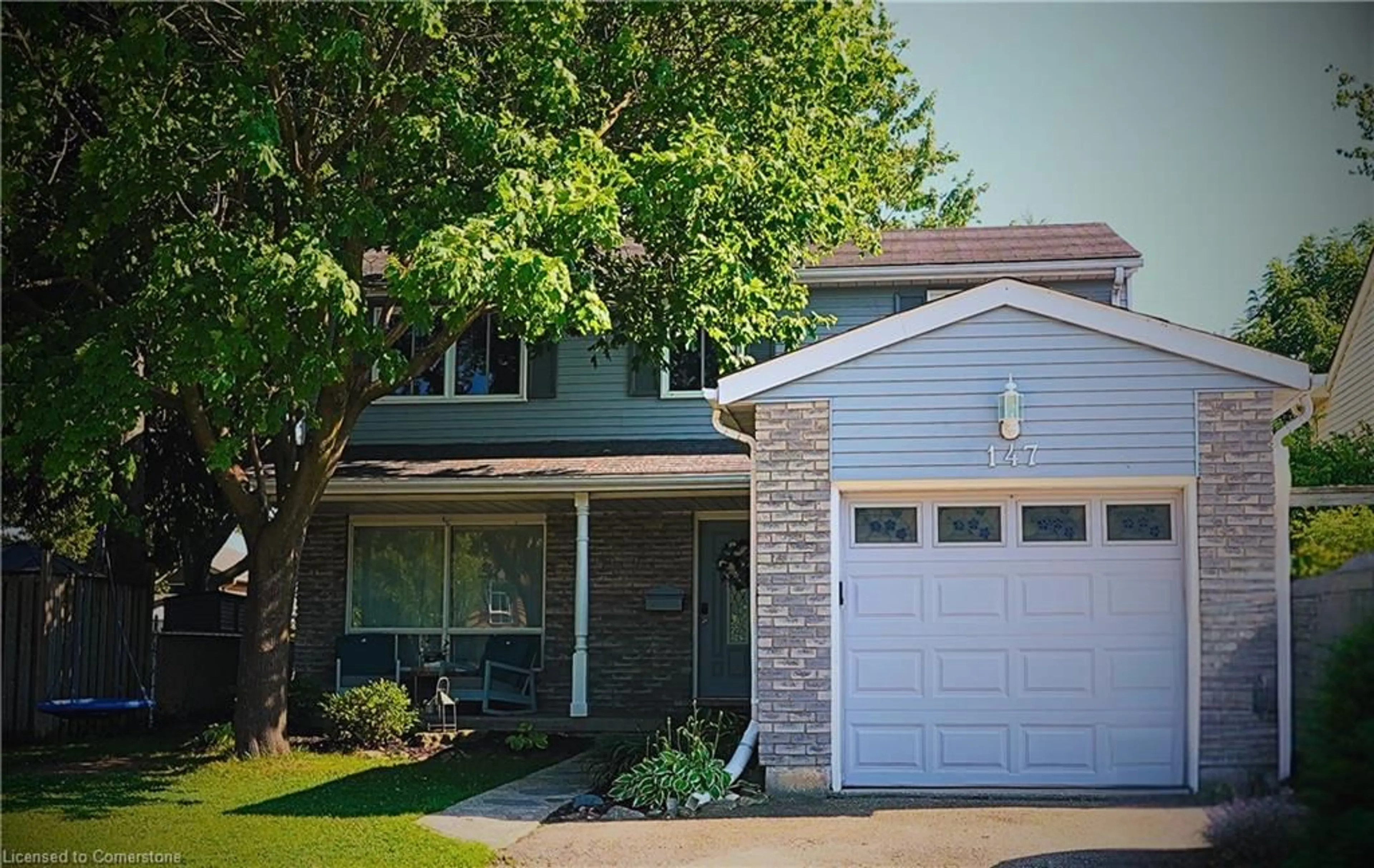 Home with vinyl exterior material, street for 147 Rolling Meadows Dr, Kitchener Ontario N2N 1X8