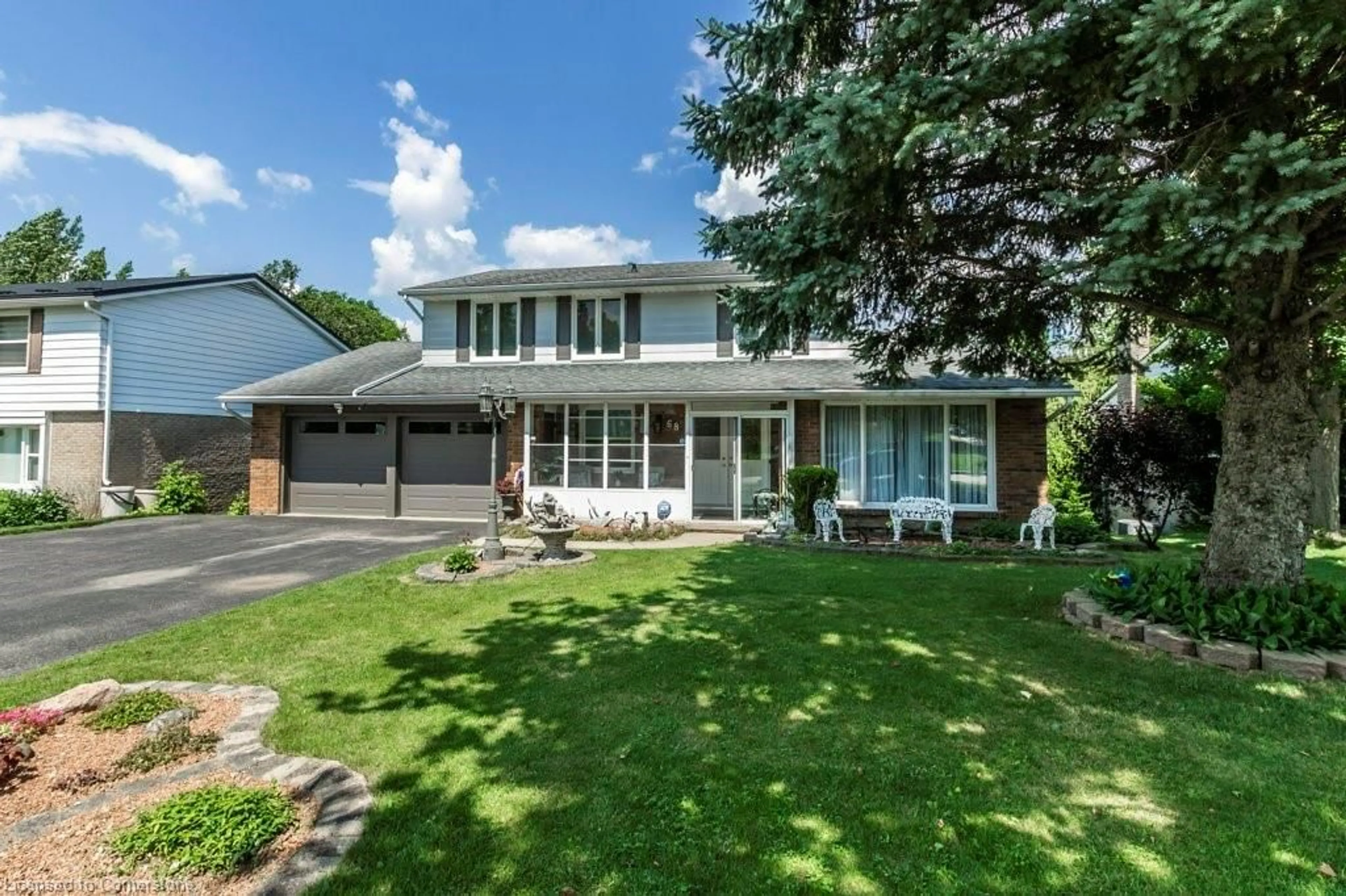 Home with brick exterior material, street for 68 Ridgeview Cres, Waterloo Ontario N2L 2P9