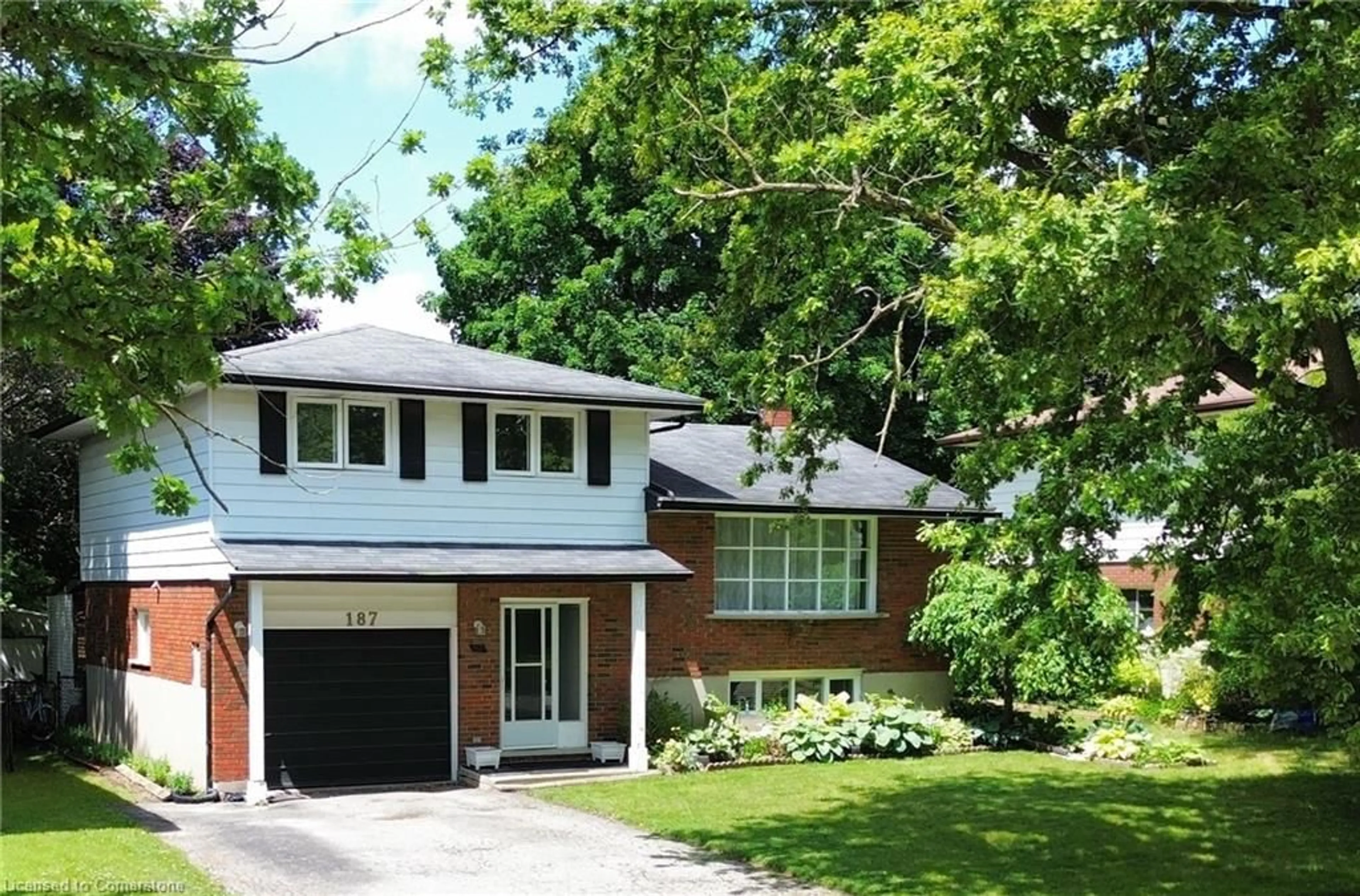 Home with brick exterior material, street for 187 Lynnbrook Cres, Waterloo Ontario N2L 4X2