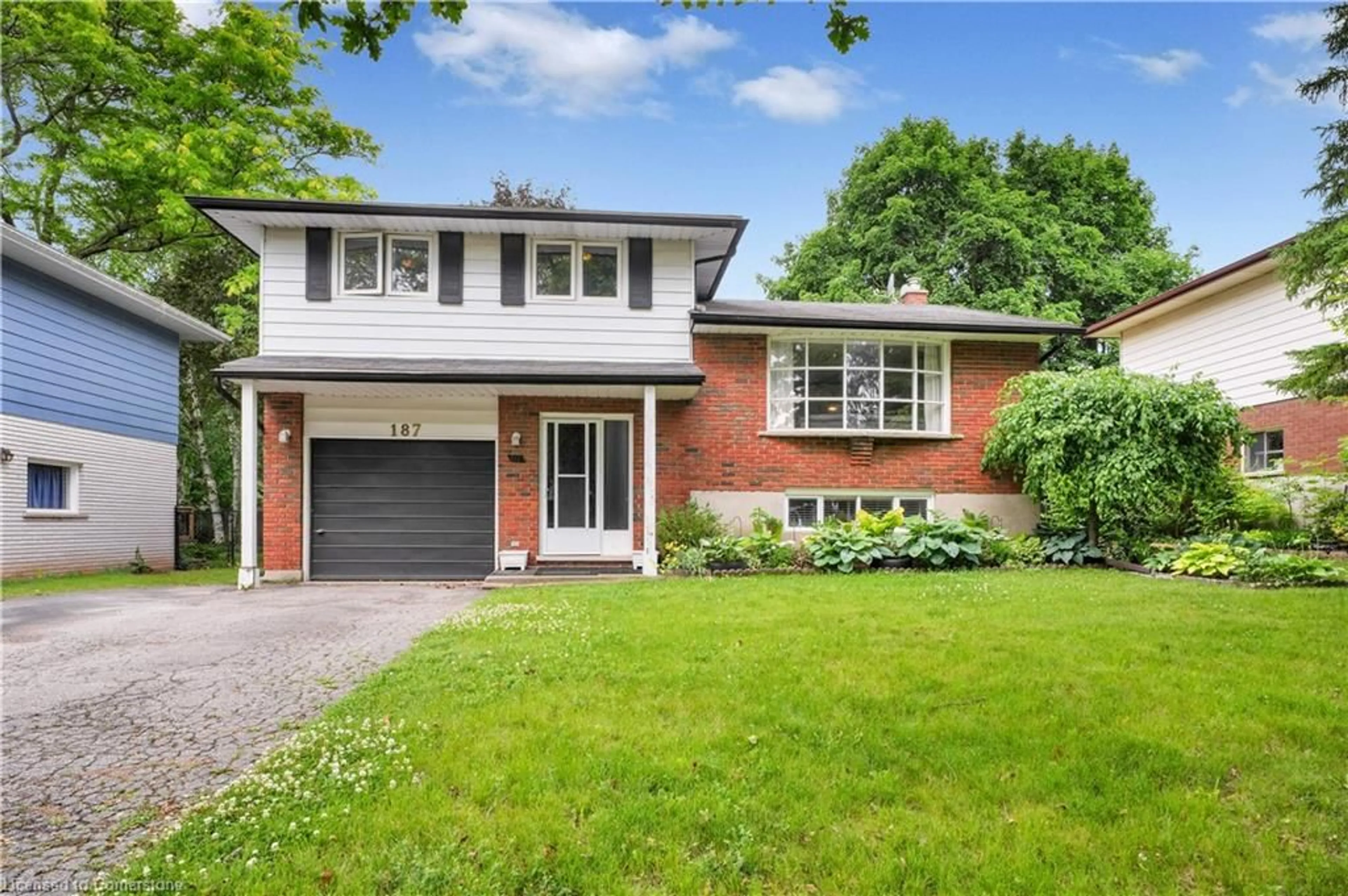 Home with brick exterior material, street for 187 Lynnbrook Cres, Waterloo Ontario N2L 4X2
