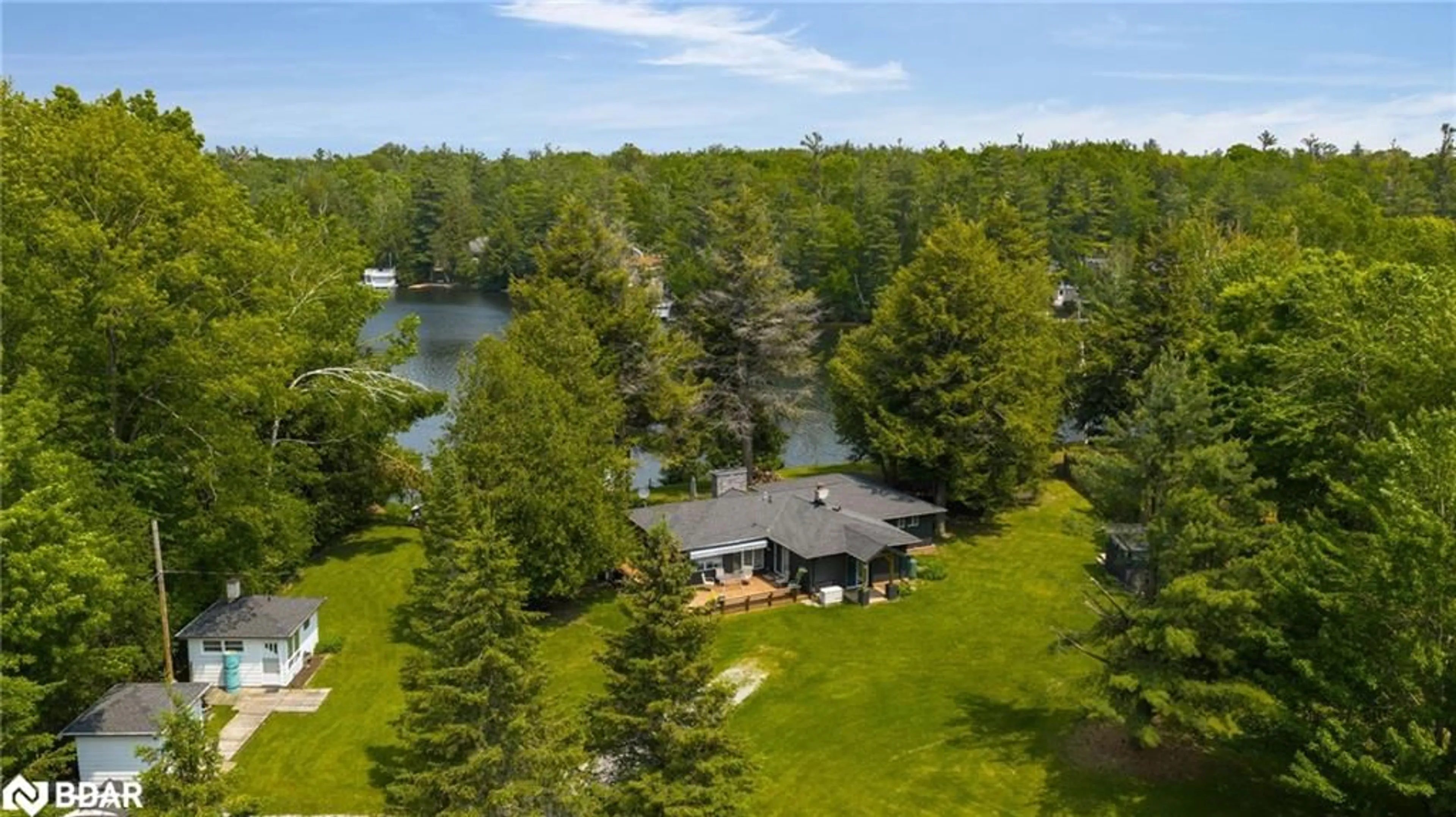 A pic from outside/outdoor area/front of a property/back of a property/a pic from drone, water/lake/river/ocean view for 22 Cardinal Dr, Woodville Ontario K0M 2T0