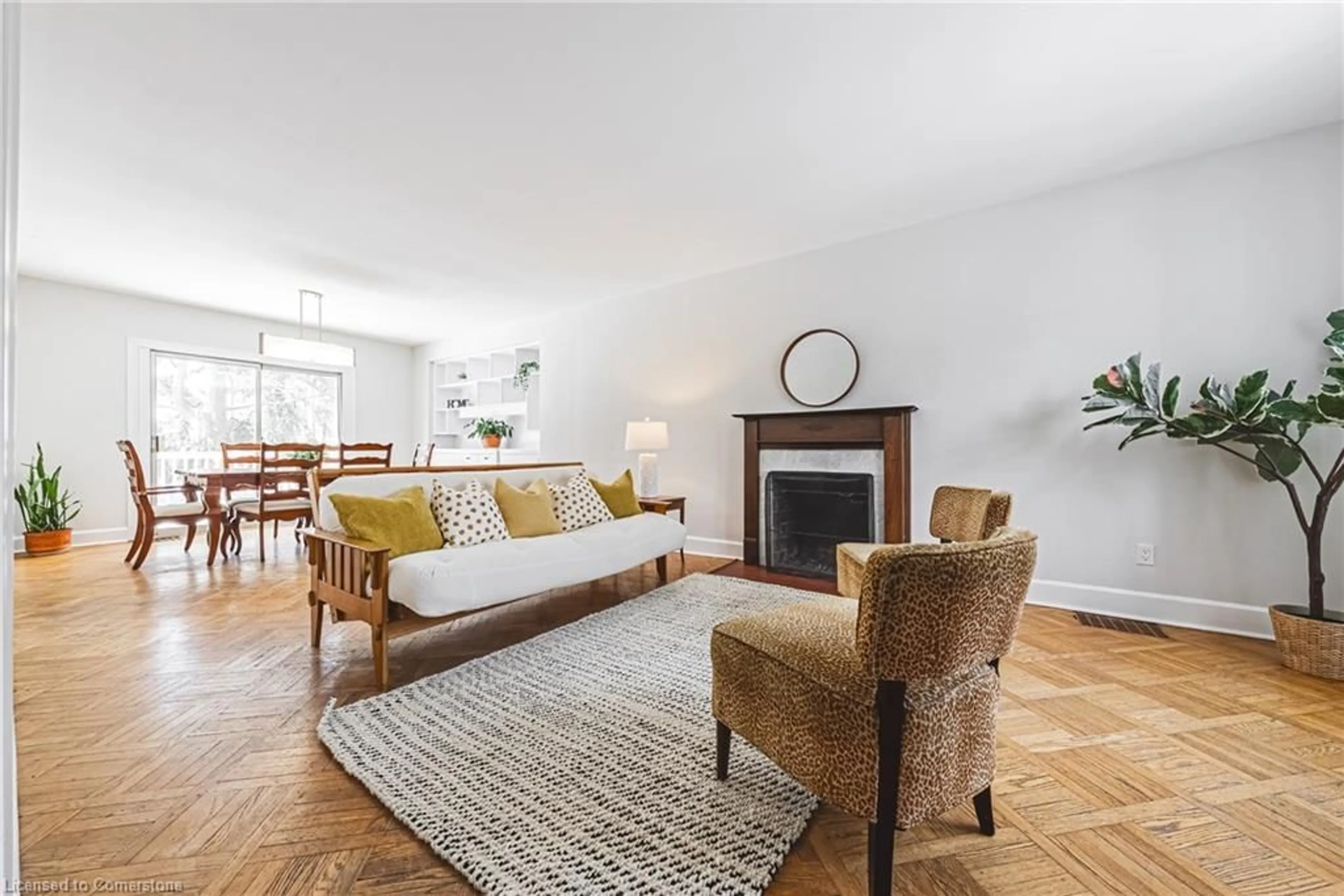 Living room with furniture, wood/laminate floor for 34 Chedoke Ave, Hamilton Ontario L8P 4N9