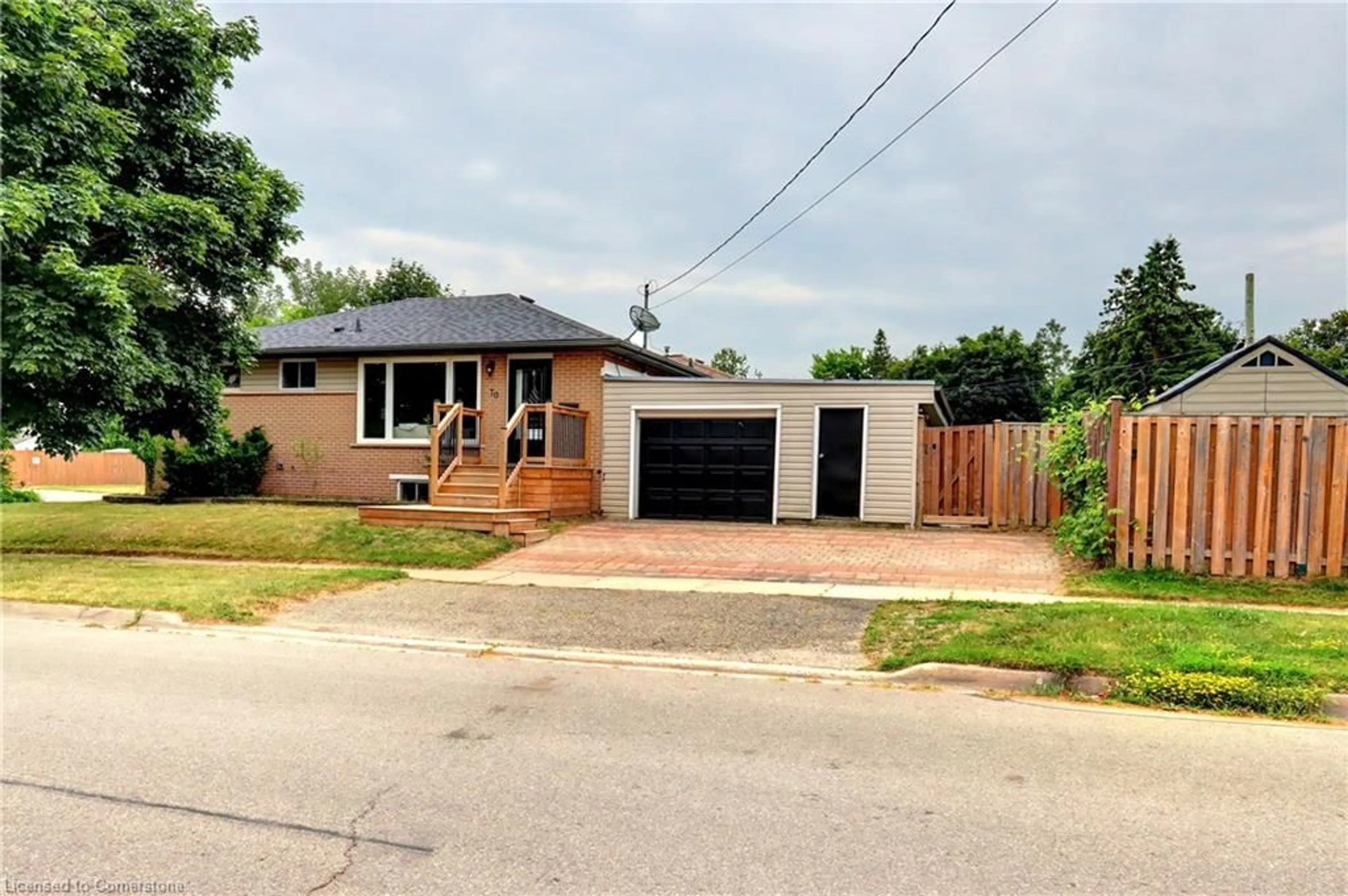 Home with brick exterior material, street for 70 Raylawn Cres, Georgetown Ontario L7G 4M9