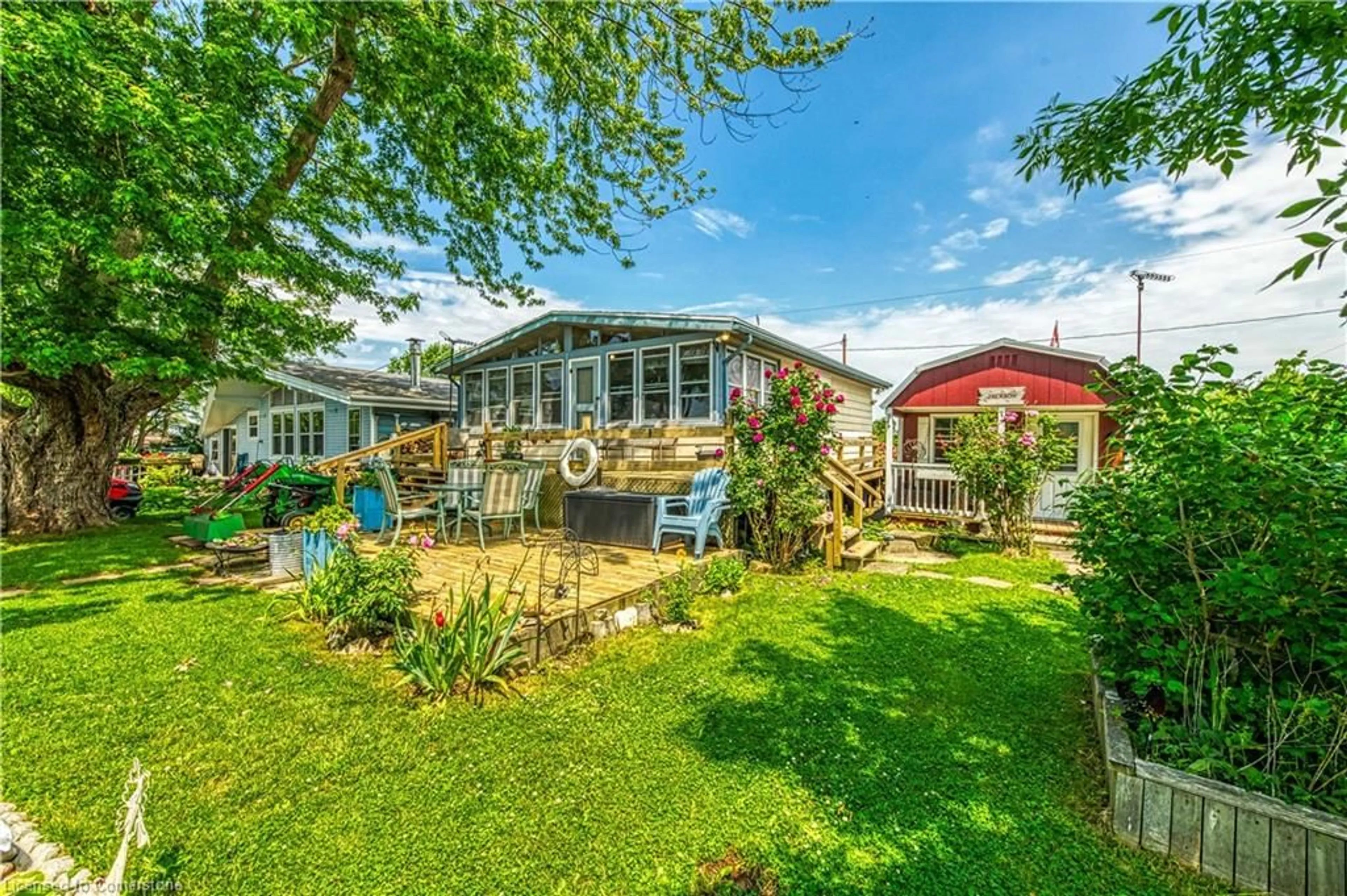A pic from outside/outdoor area/front of a property/back of a property/a pic from drone, unknown for 32 Warnick Rd, Lowbanks Ontario N0A 1K0