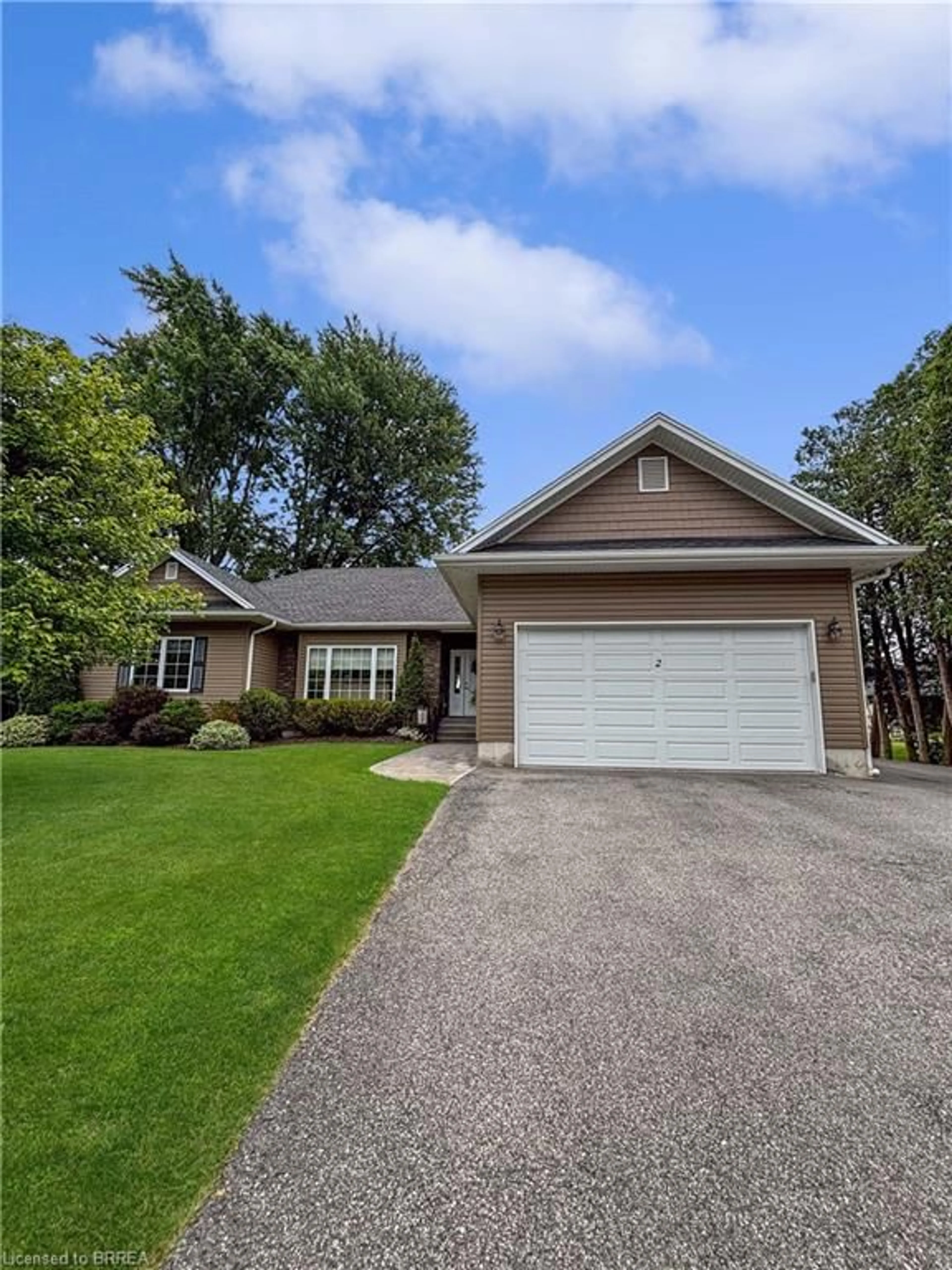 Home with vinyl exterior material, street for 2 Kitson St, Mount Pleasant Ontario N0E 1K0