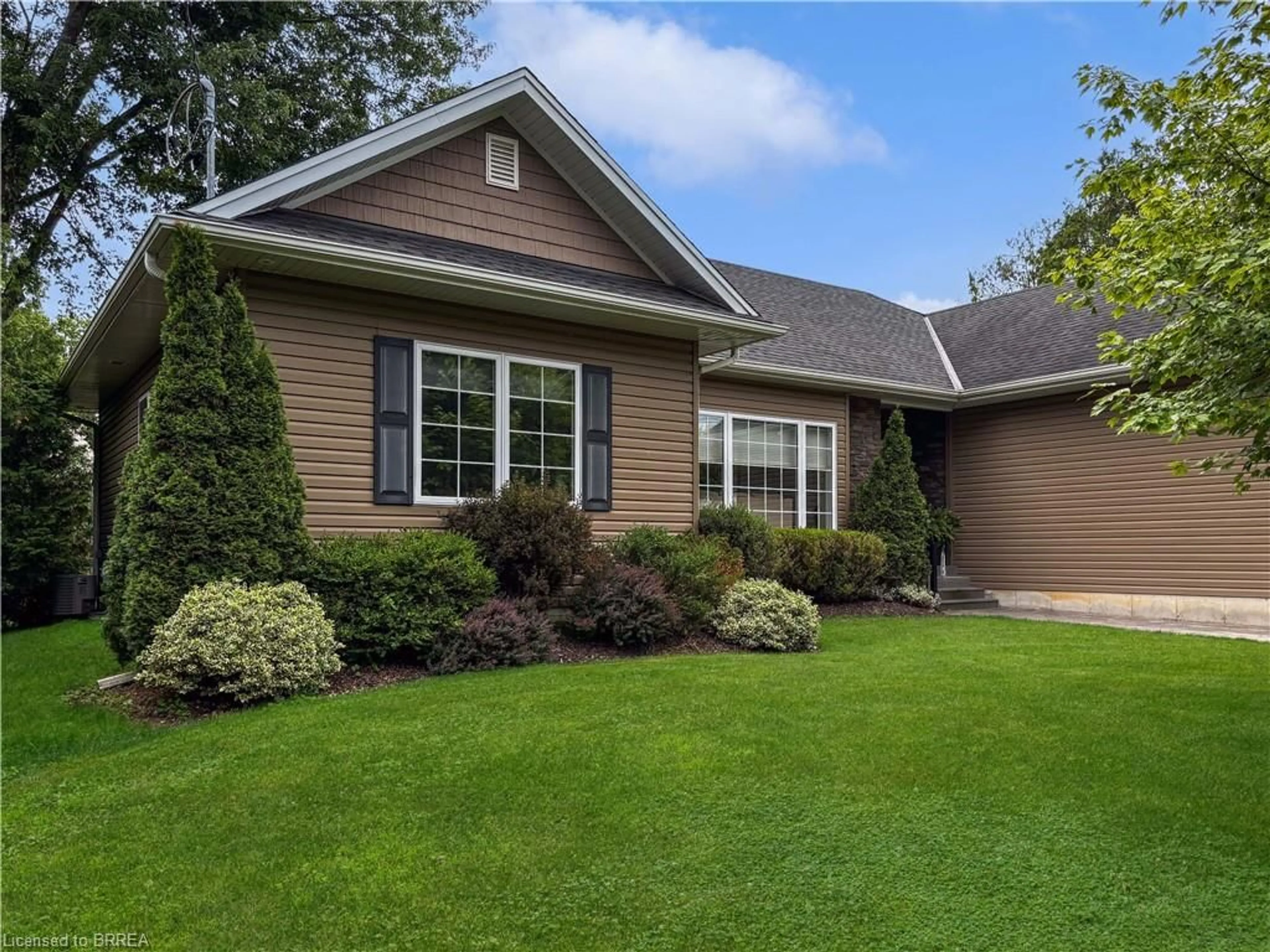 Home with vinyl exterior material, street for 2 Kitson St, Mount Pleasant Ontario N0E 1K0