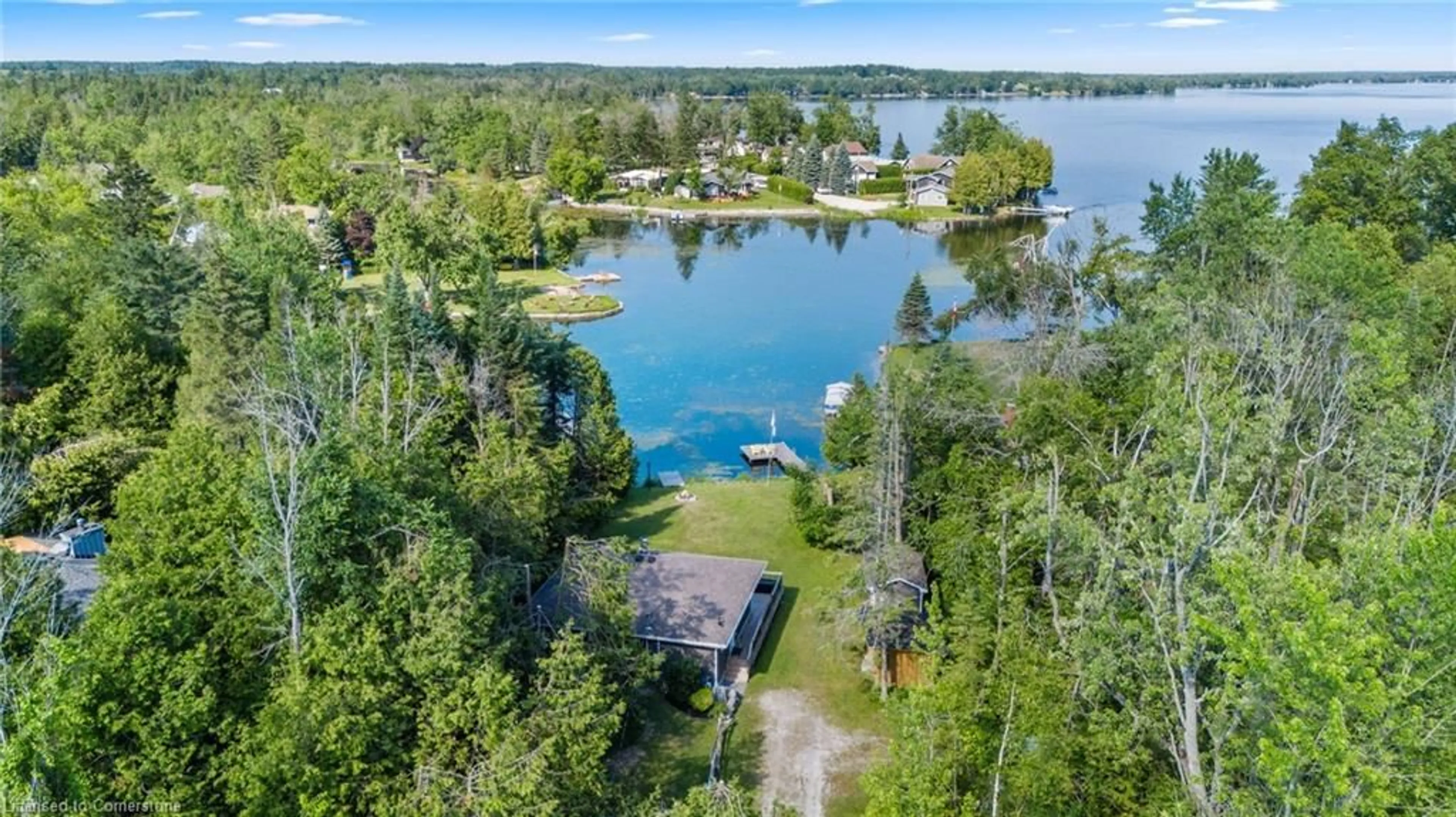 A pic from outside/outdoor area/front of a property/back of a property/a pic from drone, water/lake/river/ocean view for 46 Bayview Estates Rd, Fenelon Falls Ontario K0M 1N0