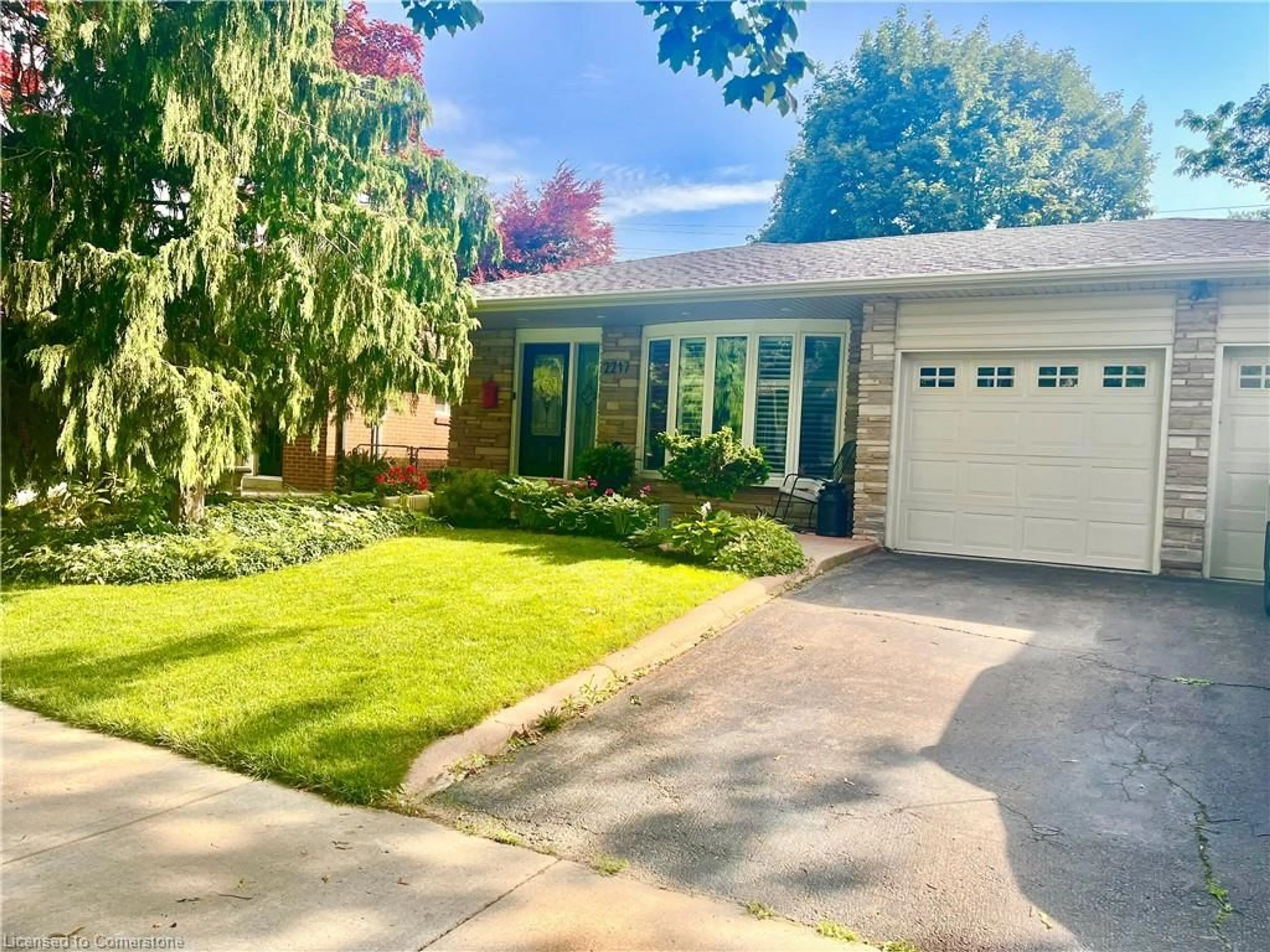 Home with brick exterior material, street for 2217 Lancaster Cres, Burlington Ontario L7P 3G4