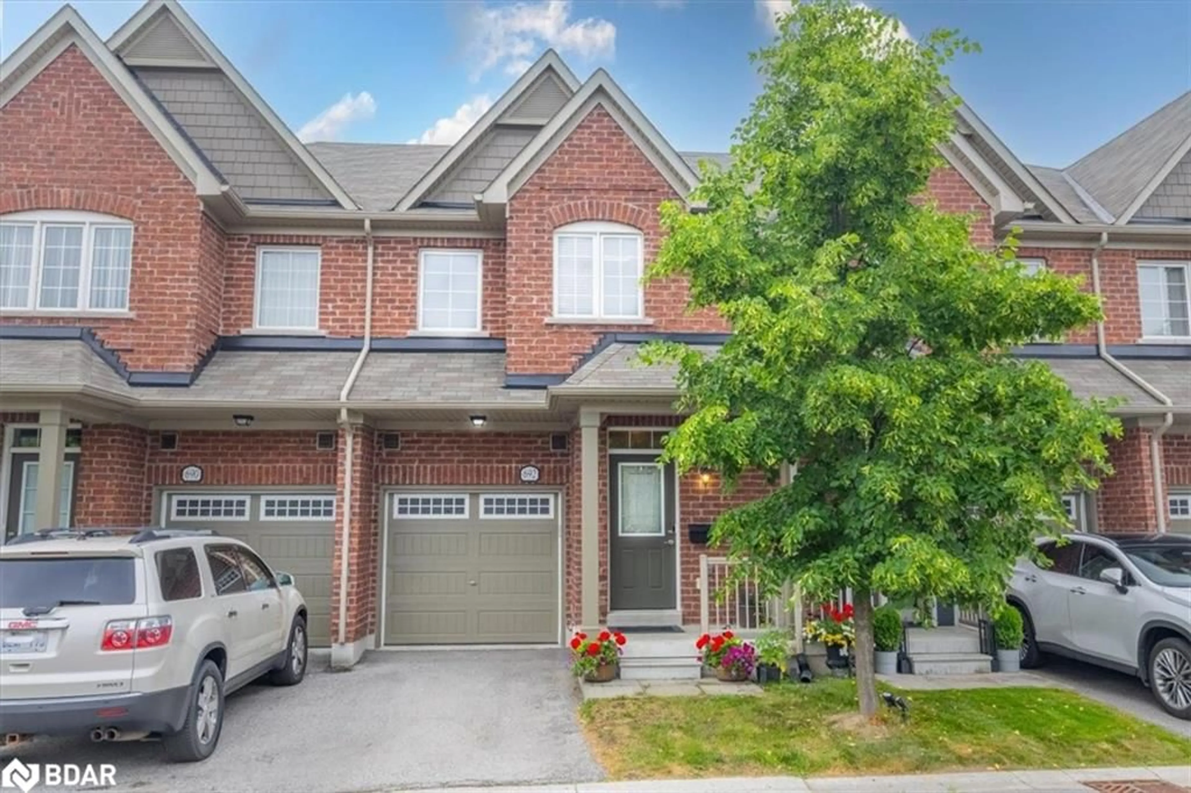 Home with brick exterior material, street for 692 Wendy Culbert Cres, Newmarket Ontario L3X 0A4