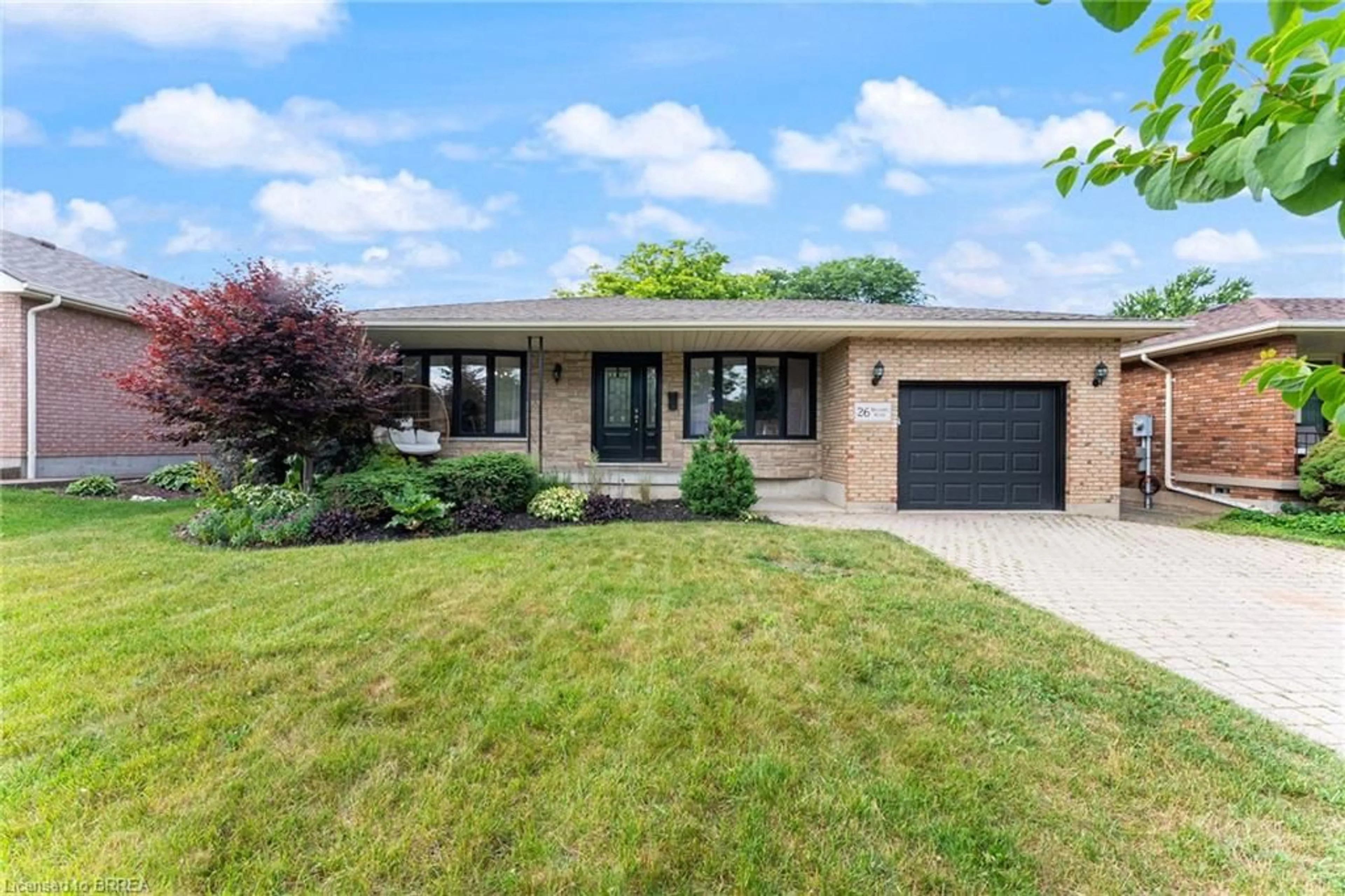 Home with brick exterior material, street for 26 Belaire Rd, Brantford Ontario N3R 6Z3