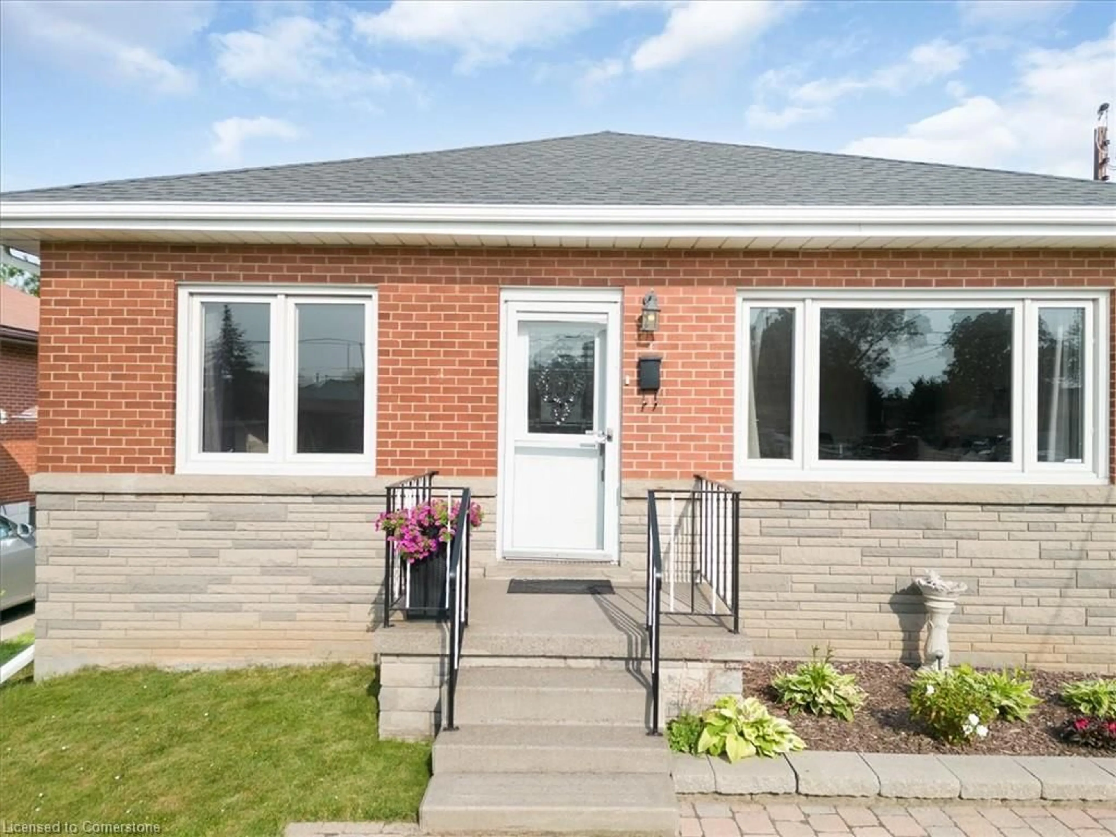 Home with brick exterior material, street for 406 Talbot St, Hamilton Ontario L8H 6T4