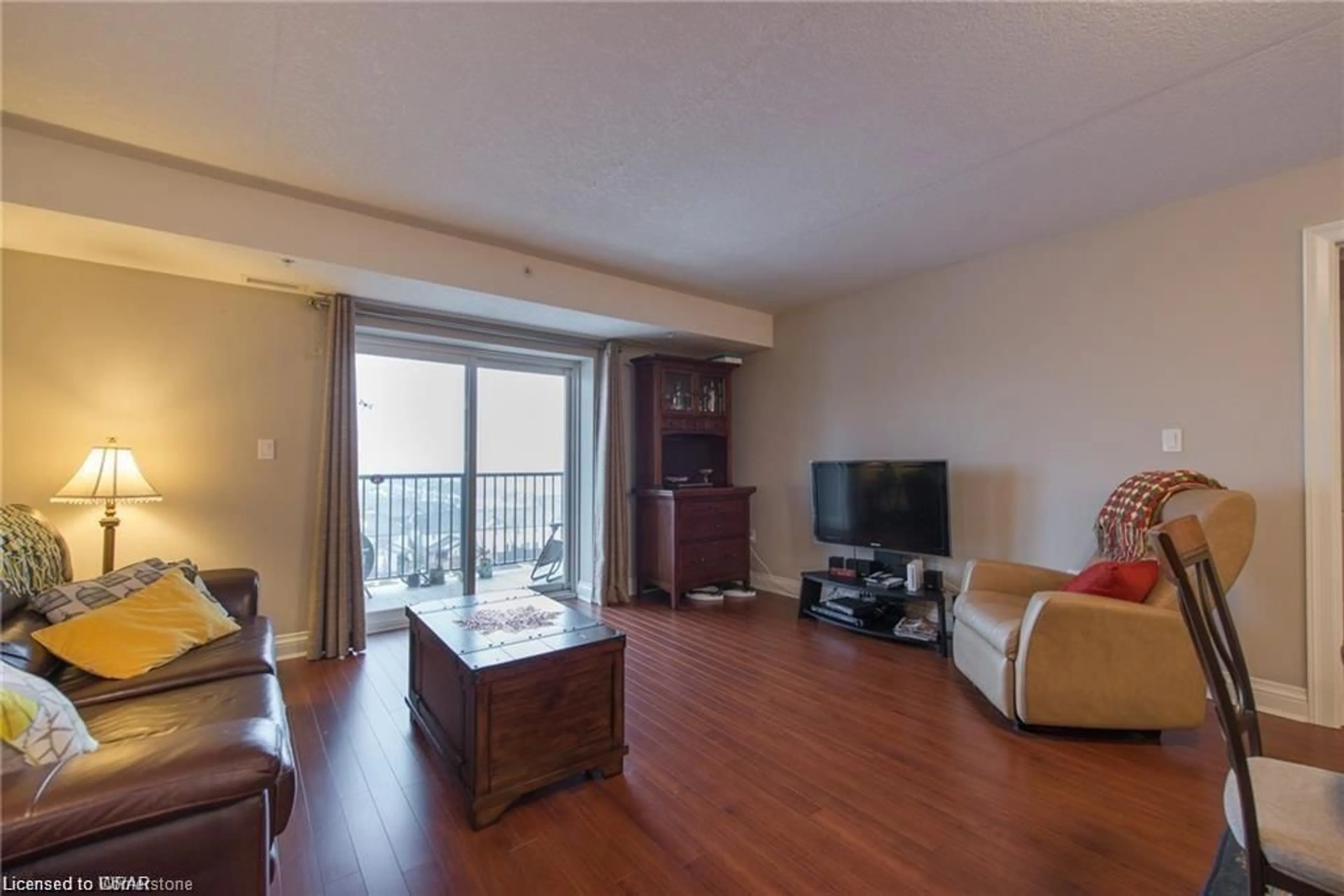 Living room with furniture, wood/laminate floor for 776 Laurelwood Dr #509, Waterloo Ontario N2V 0A8