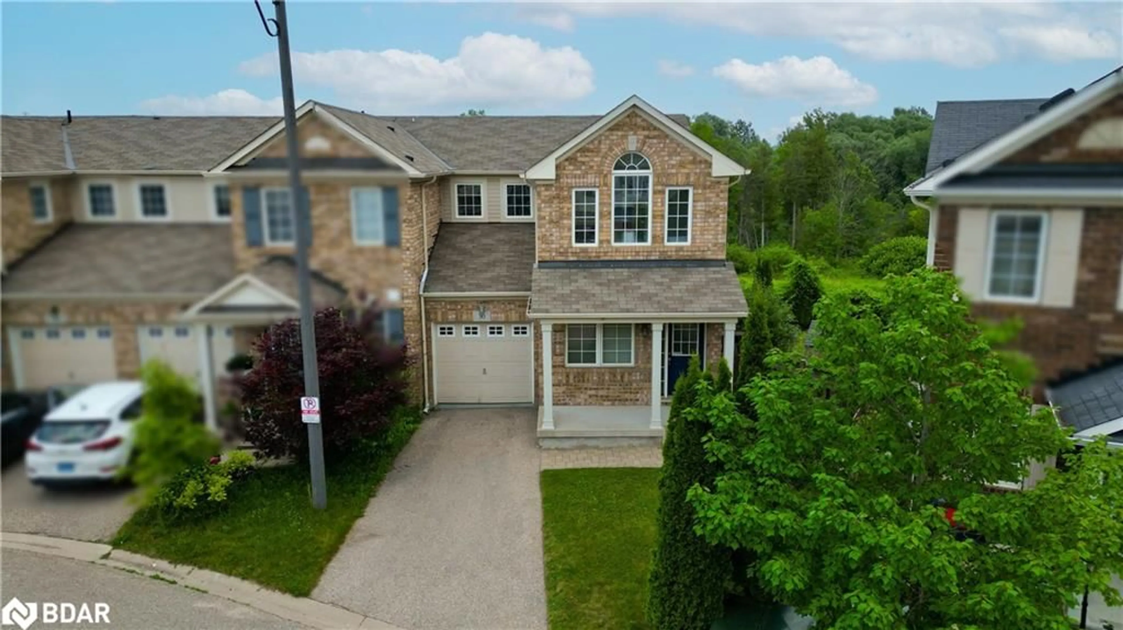 A pic from outside/outdoor area/front of a property/back of a property/a pic from drone, street for 30 Manhattan Cir, Cambridge Ontario N3C 0C4