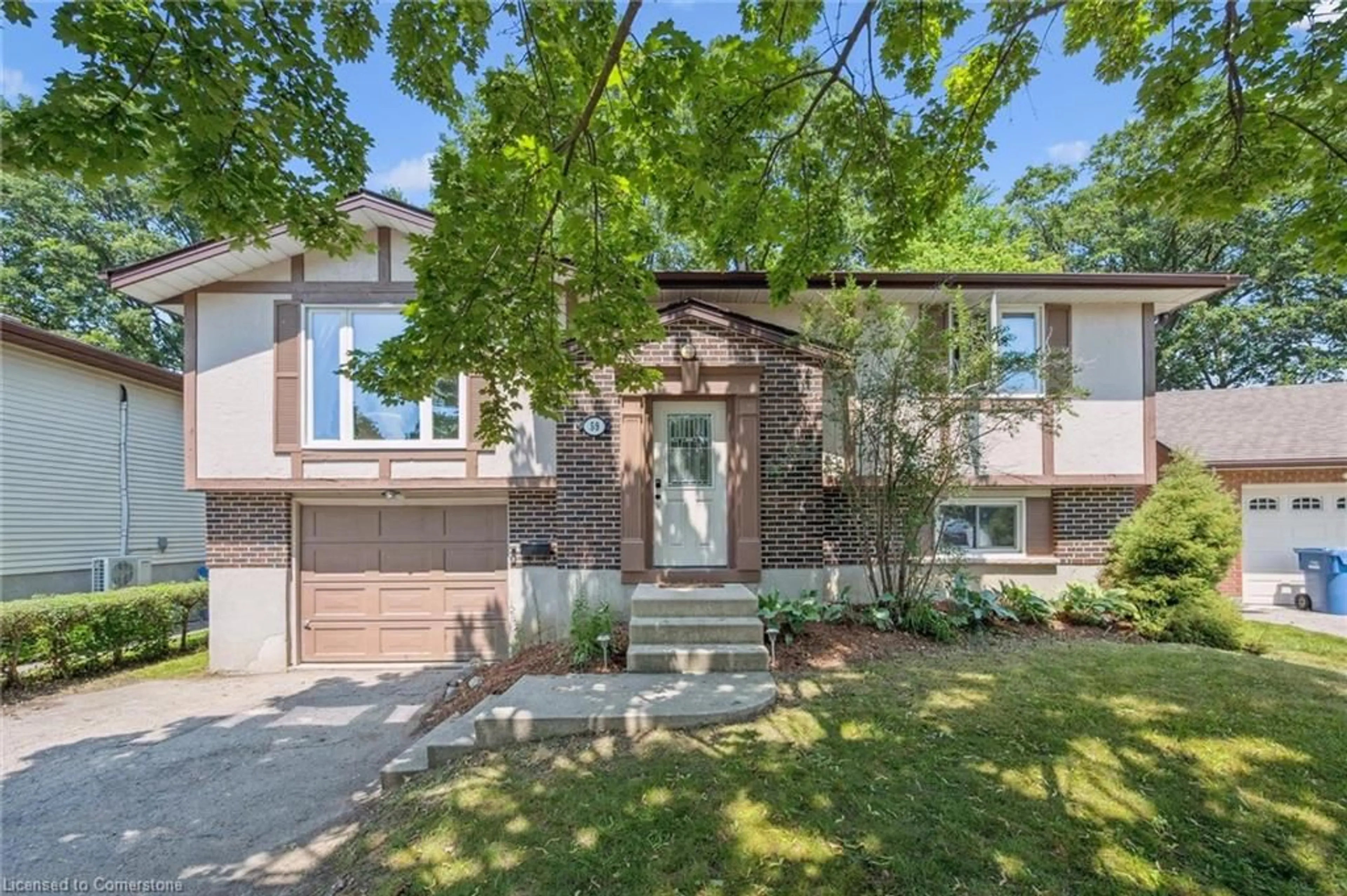 Home with vinyl exterior material, street for 59 Steffler Dr, Guelph Ontario N1G 3L5