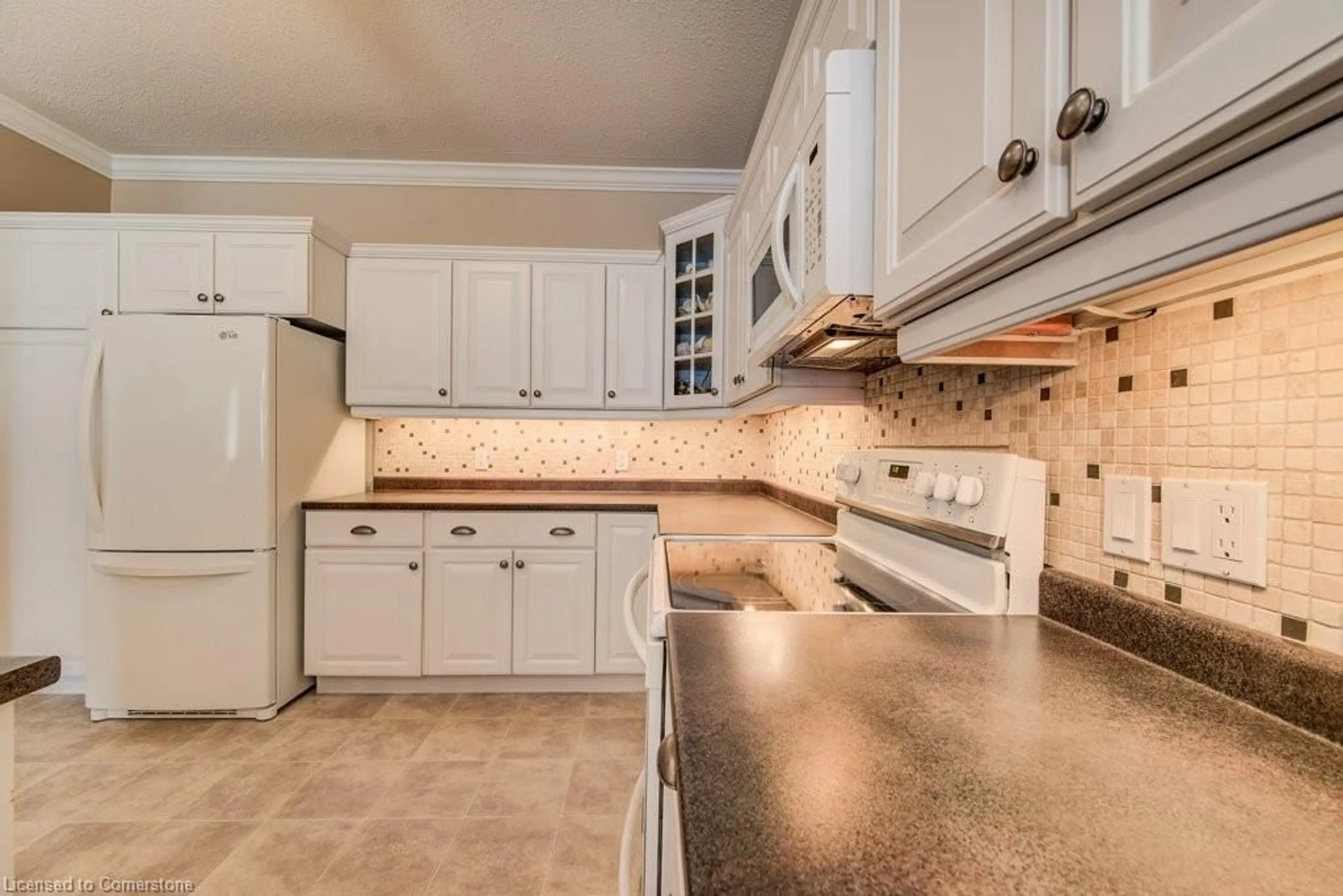 Open concept kitchen, ceramic/tile floor for 20 Isherwood Ave #107, Cambridge Ontario N1R 8P9