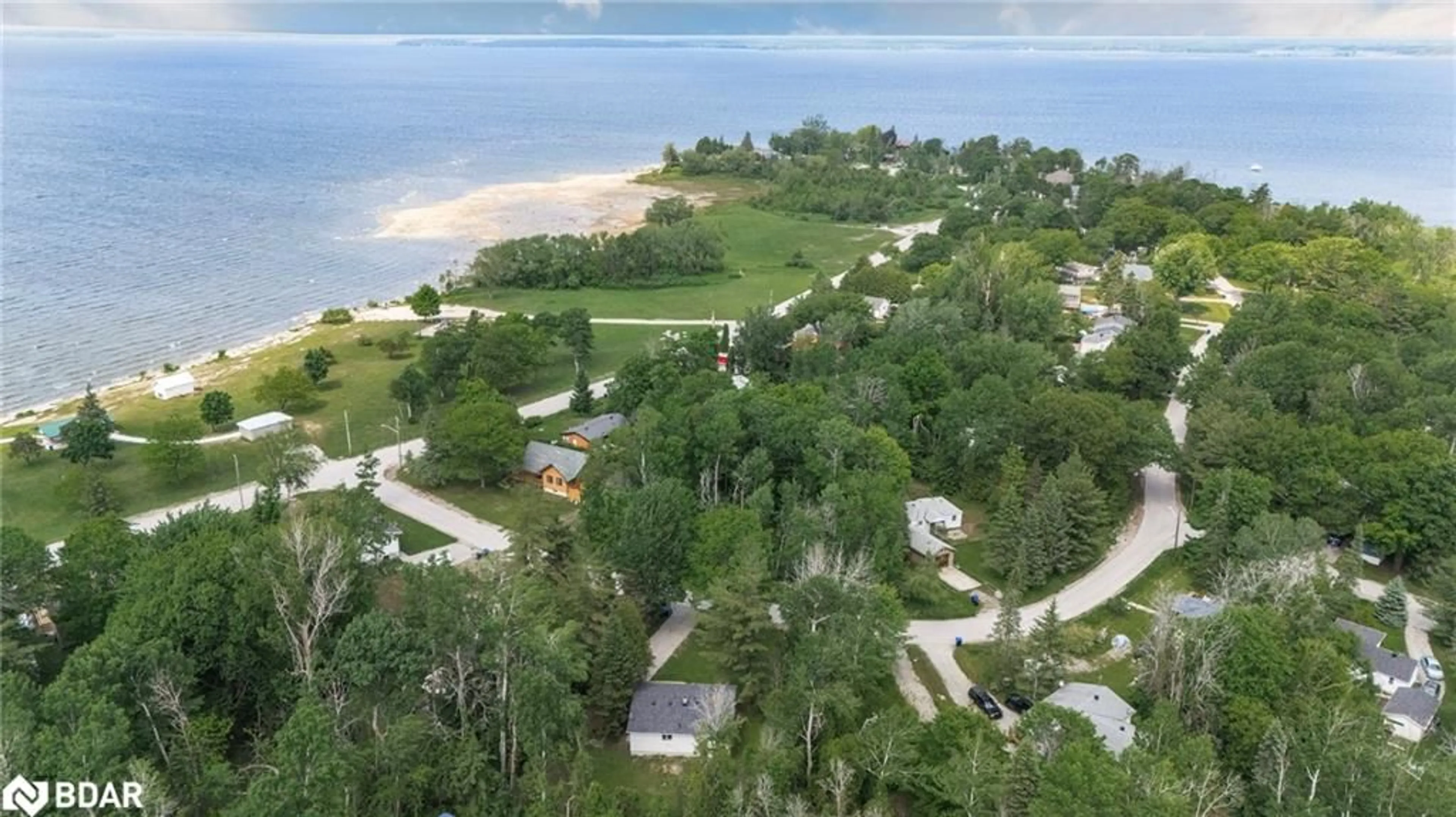 A pic from outside/outdoor area/front of a property/back of a property/a pic from drone, water/lake/river/ocean view for 185 Silver Birch Cres Cres, Port McNicoll Ontario L0K 1R0