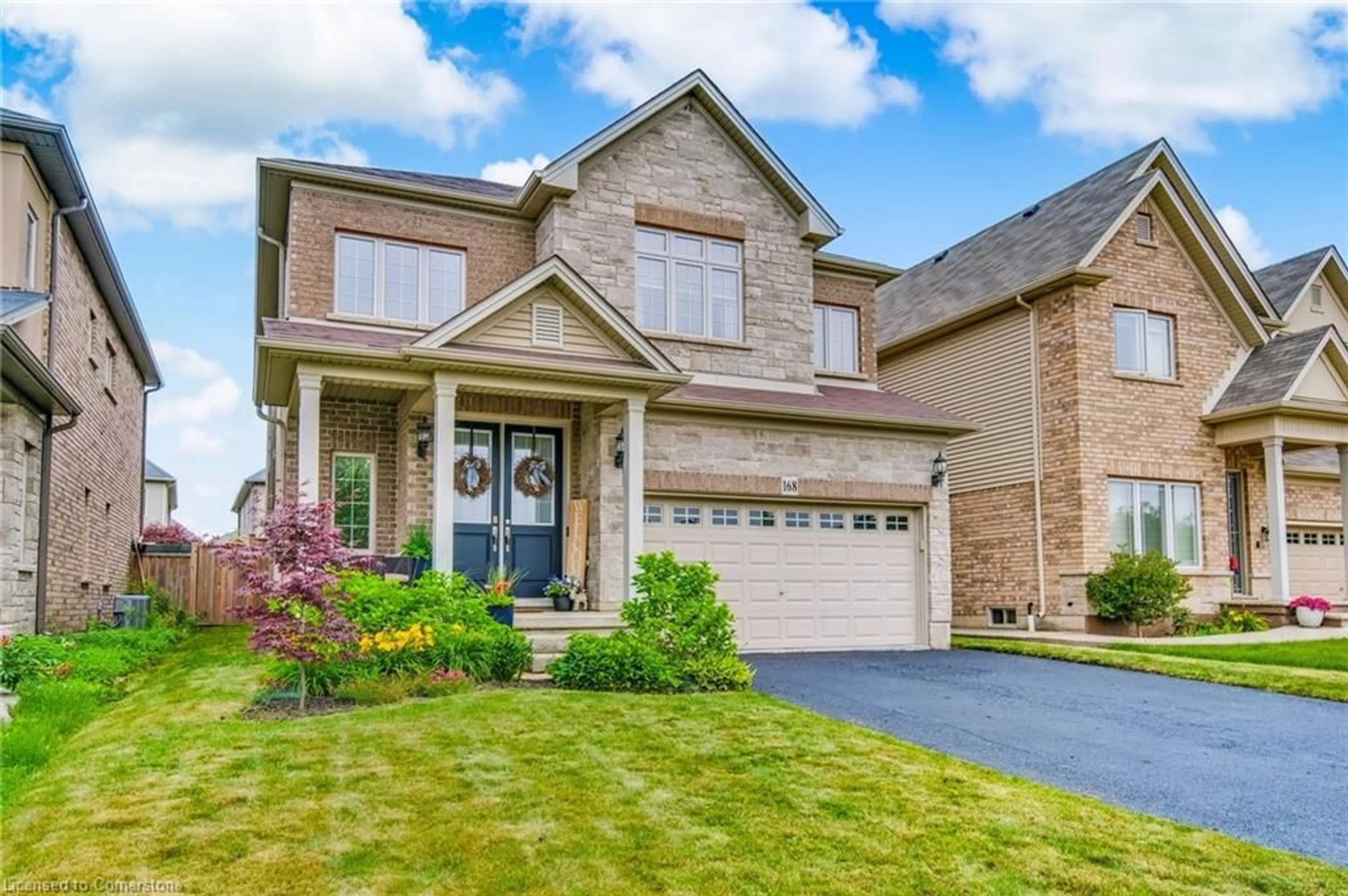 Home with brick exterior material, street for 168 Bookjans Dr, Hamilton Ontario L9G 0B7