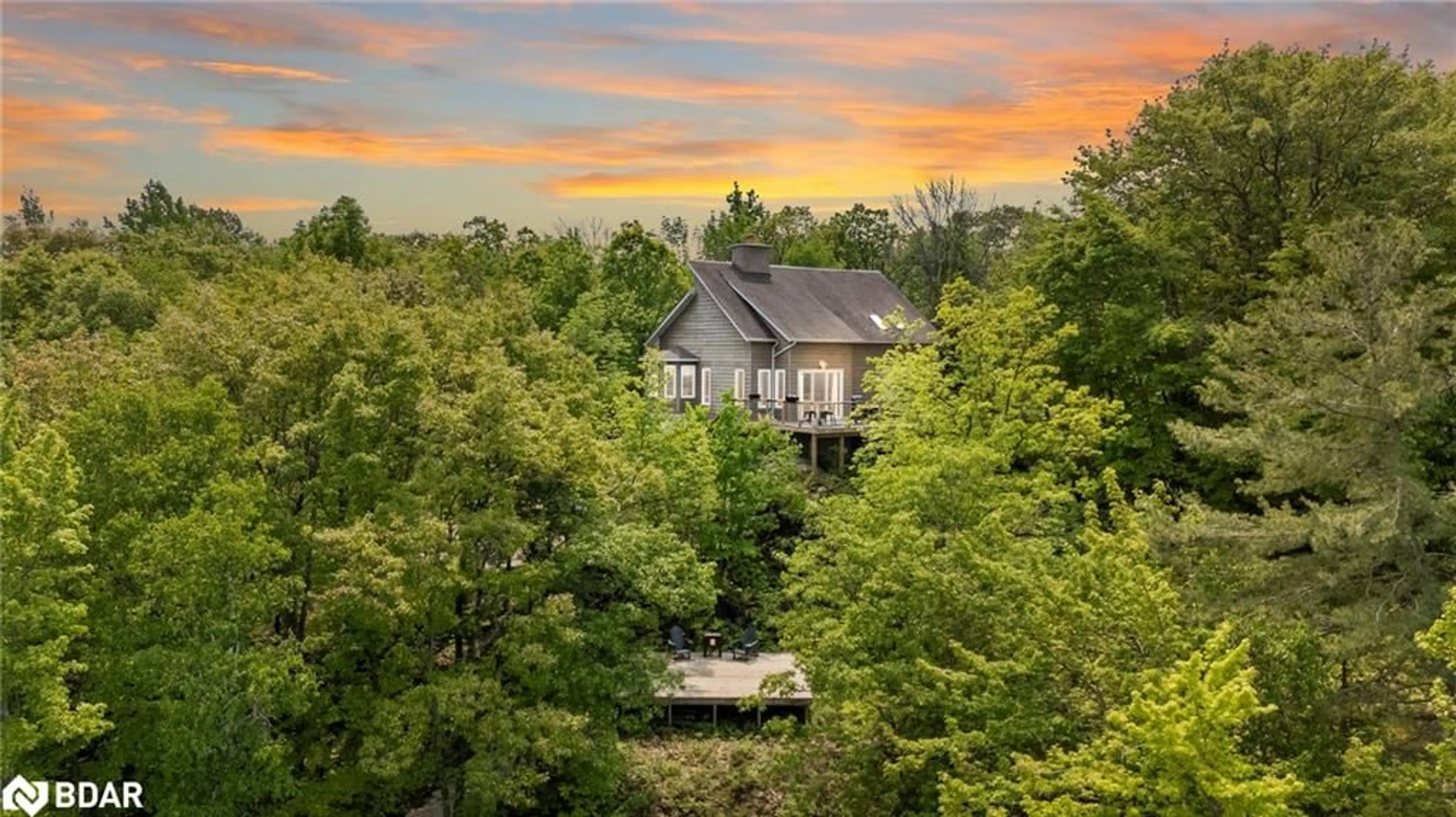 A pic from outside/outdoor area/front of a property/back of a property/a pic from drone, forest/trees view for 2043 Beman Point Lane, Coldwater Ontario L0K 1E0