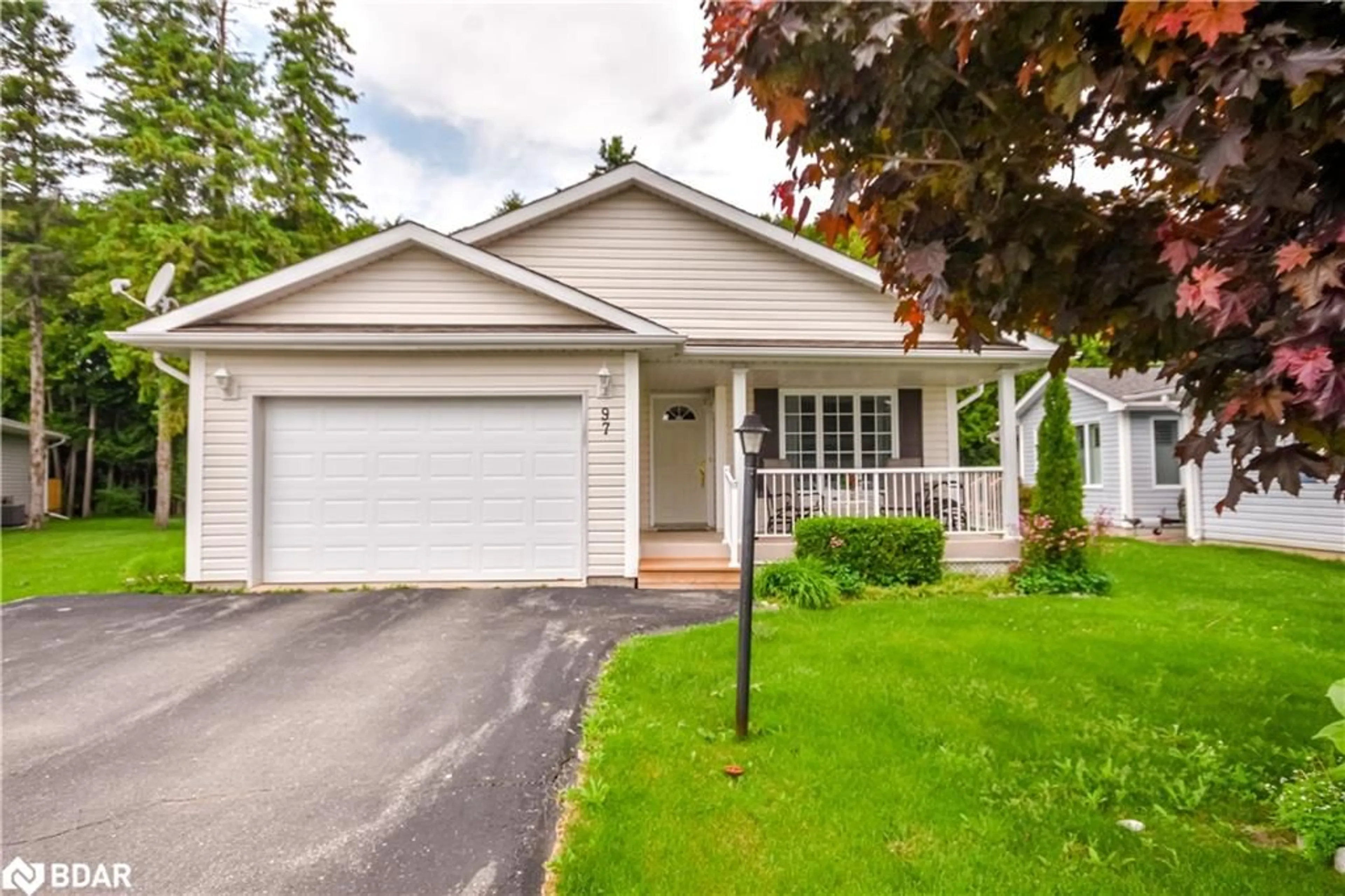 Home with vinyl exterior material, street for 97 Pennsylvania Ave, Wasaga Beach Ontario L9Z 3A8