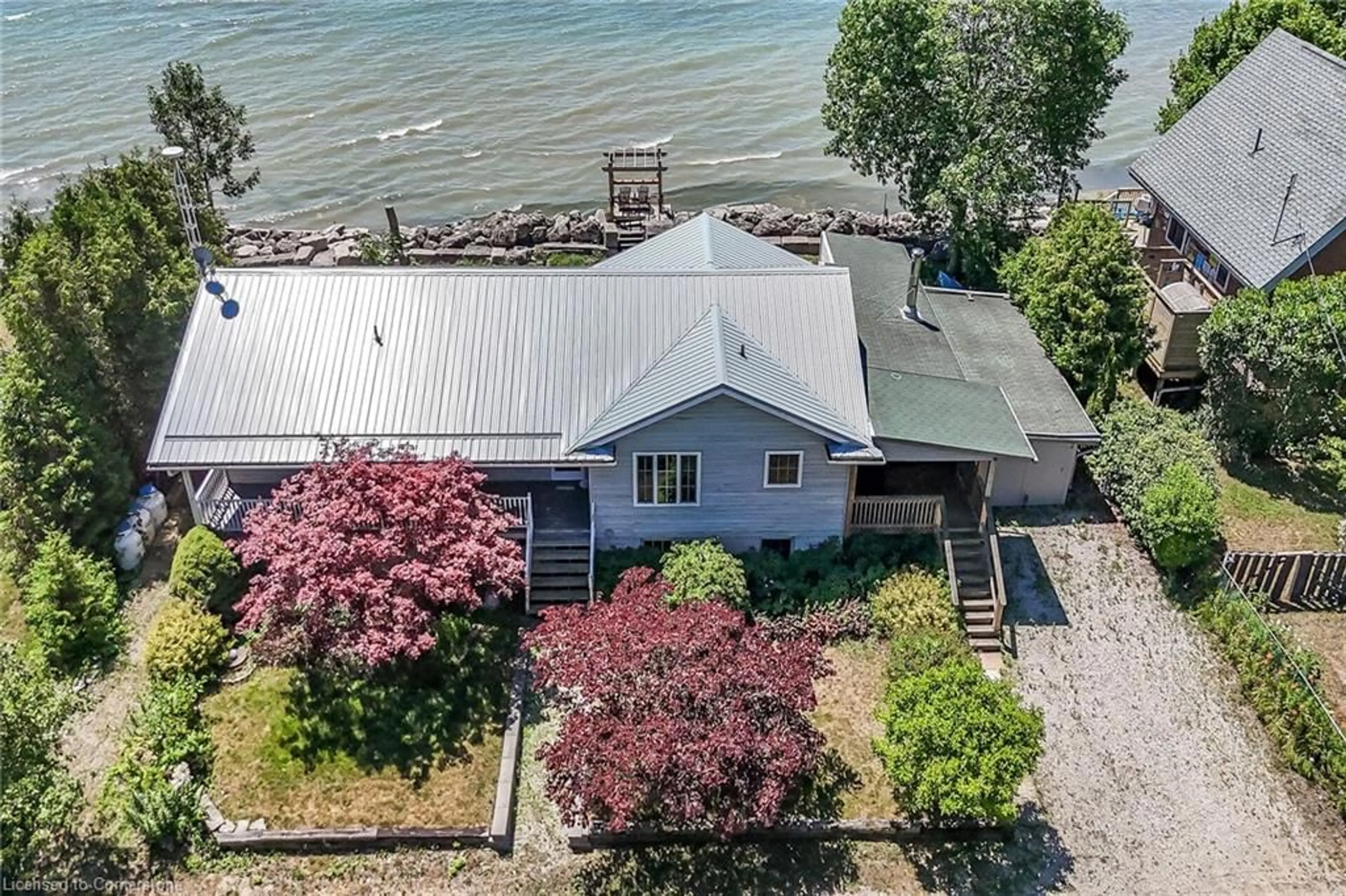 A pic from outside/outdoor area/front of a property/back of a property/a pic from drone, water/lake/river/ocean view for 8 Seagull Lane, Selkirk Ontario N0A 1P0