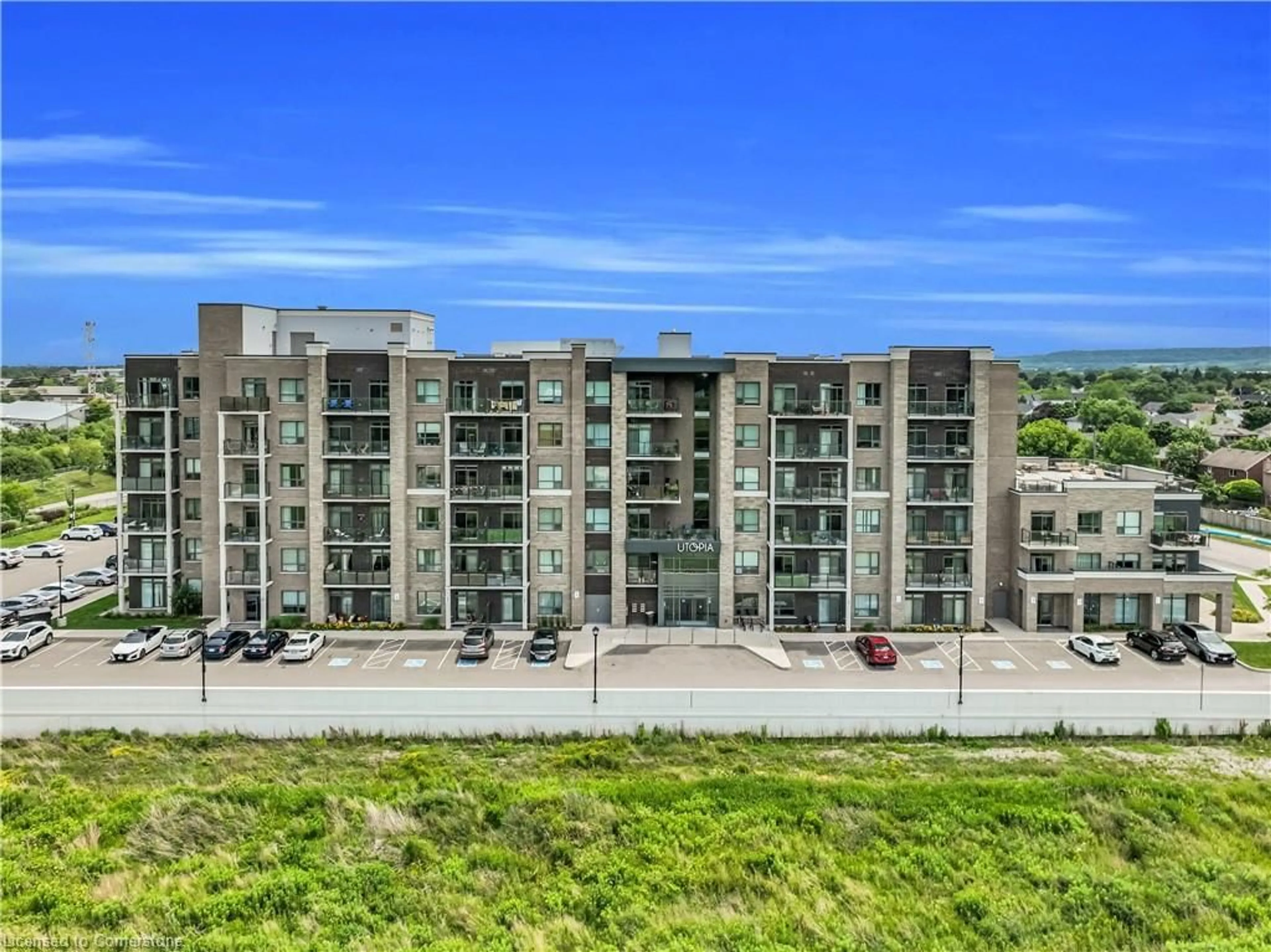 A pic from outside/outdoor area/front of a property/back of a property/a pic from drone, city buildings view from balcony for 5055 Greenlane Rd #208, Beamsville Ontario L3J 2L3