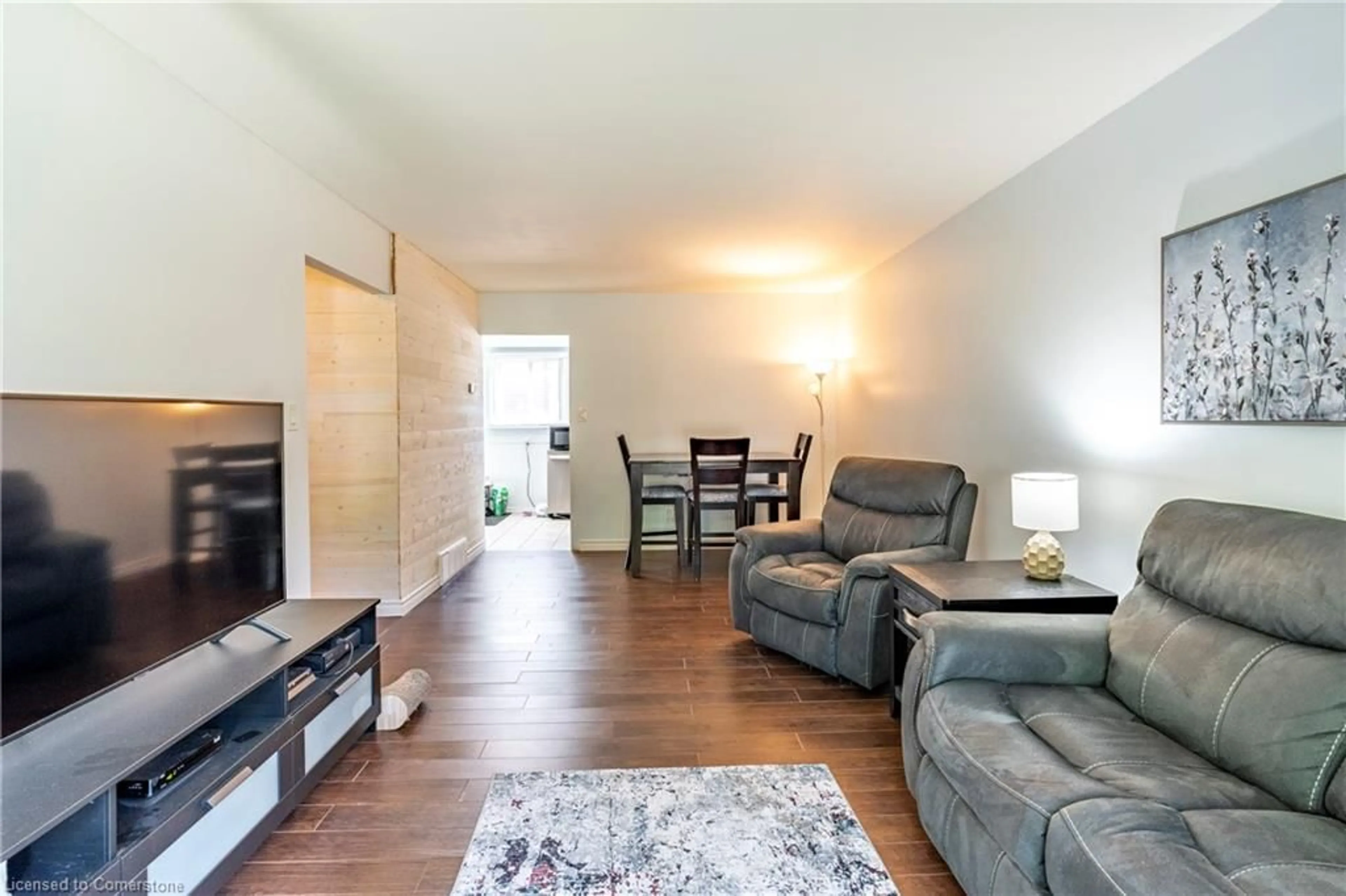Living room with furniture, wood/laminate floor for 4 Tamarack Crt, Cambridge Ontario N3C 3A8