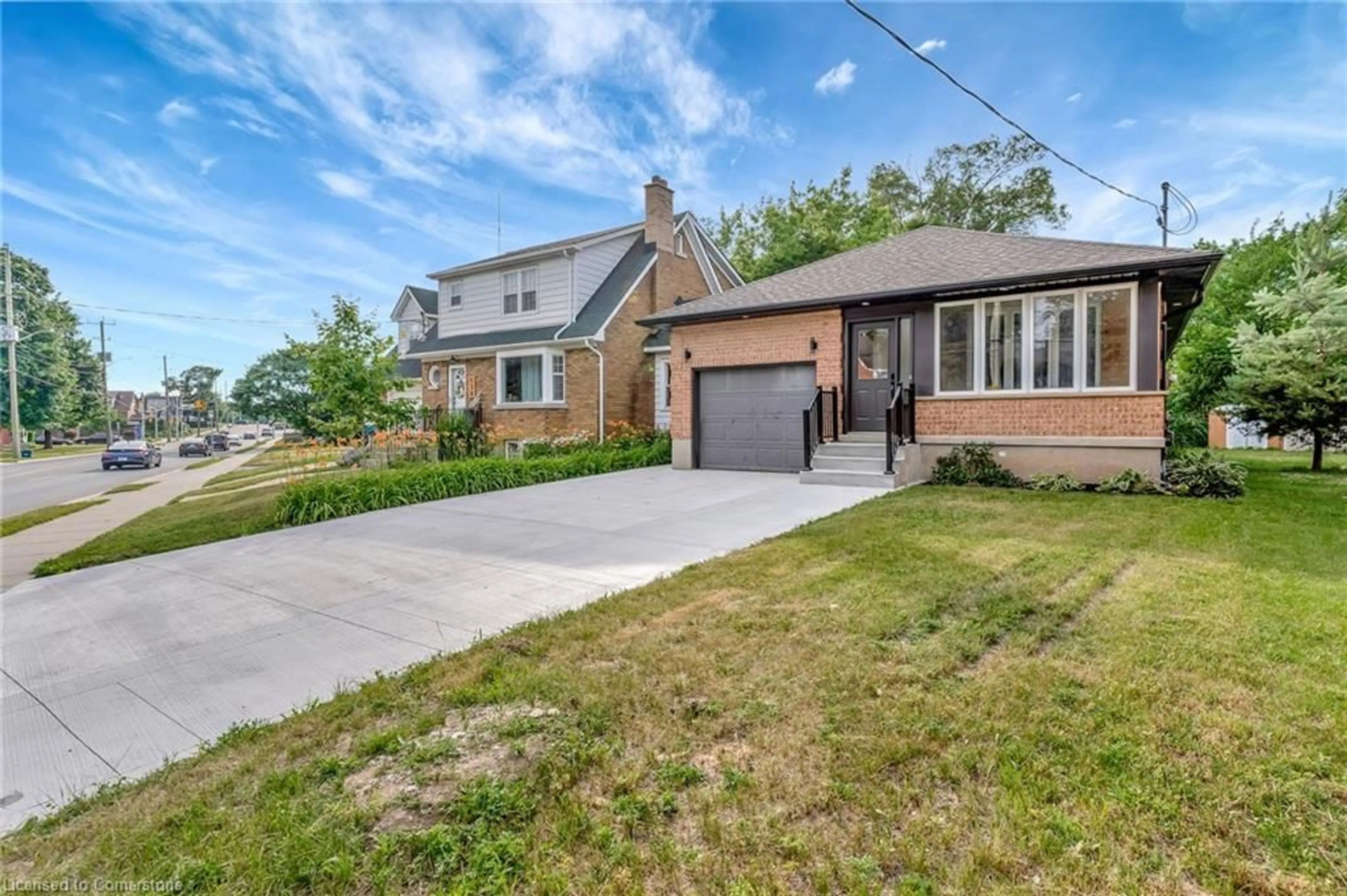 Home with brick exterior material, street for 126 Highland Rd, Kitchener Ontario N2M 3B8