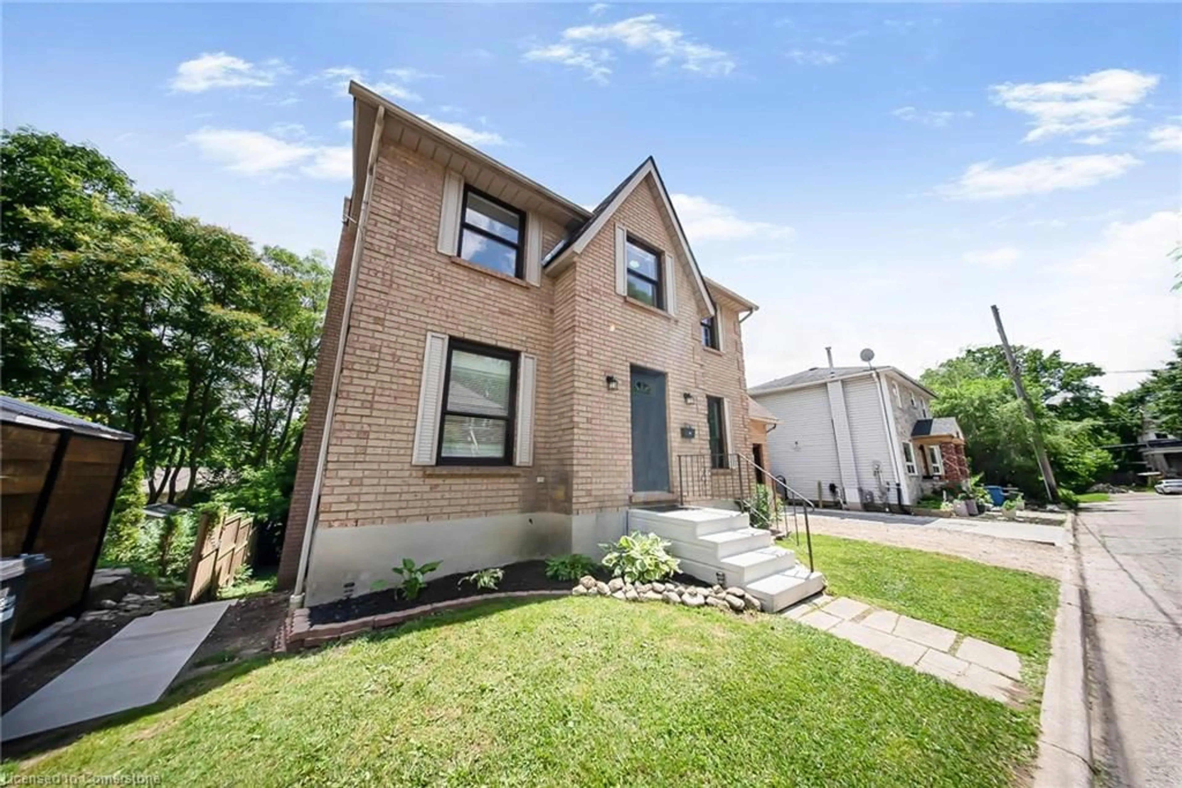 Home with brick exterior material, street for 82 Galt St, Guelph Ontario N1H 6J2