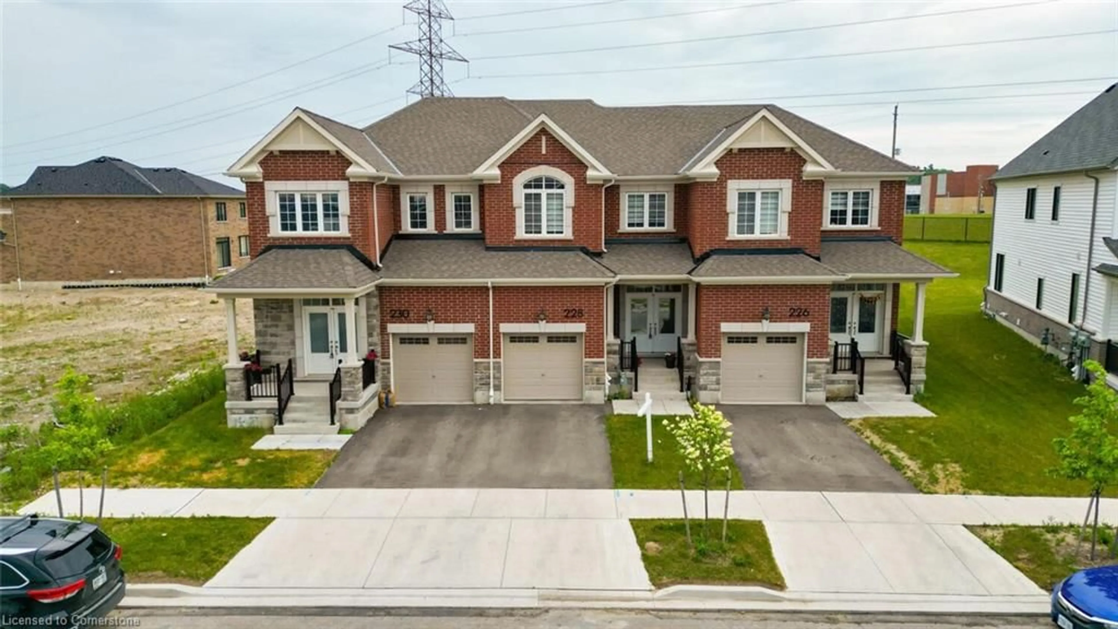 Home with brick exterior material, street for 228 Histand Trail, Kitchener Ontario N2R 0S3