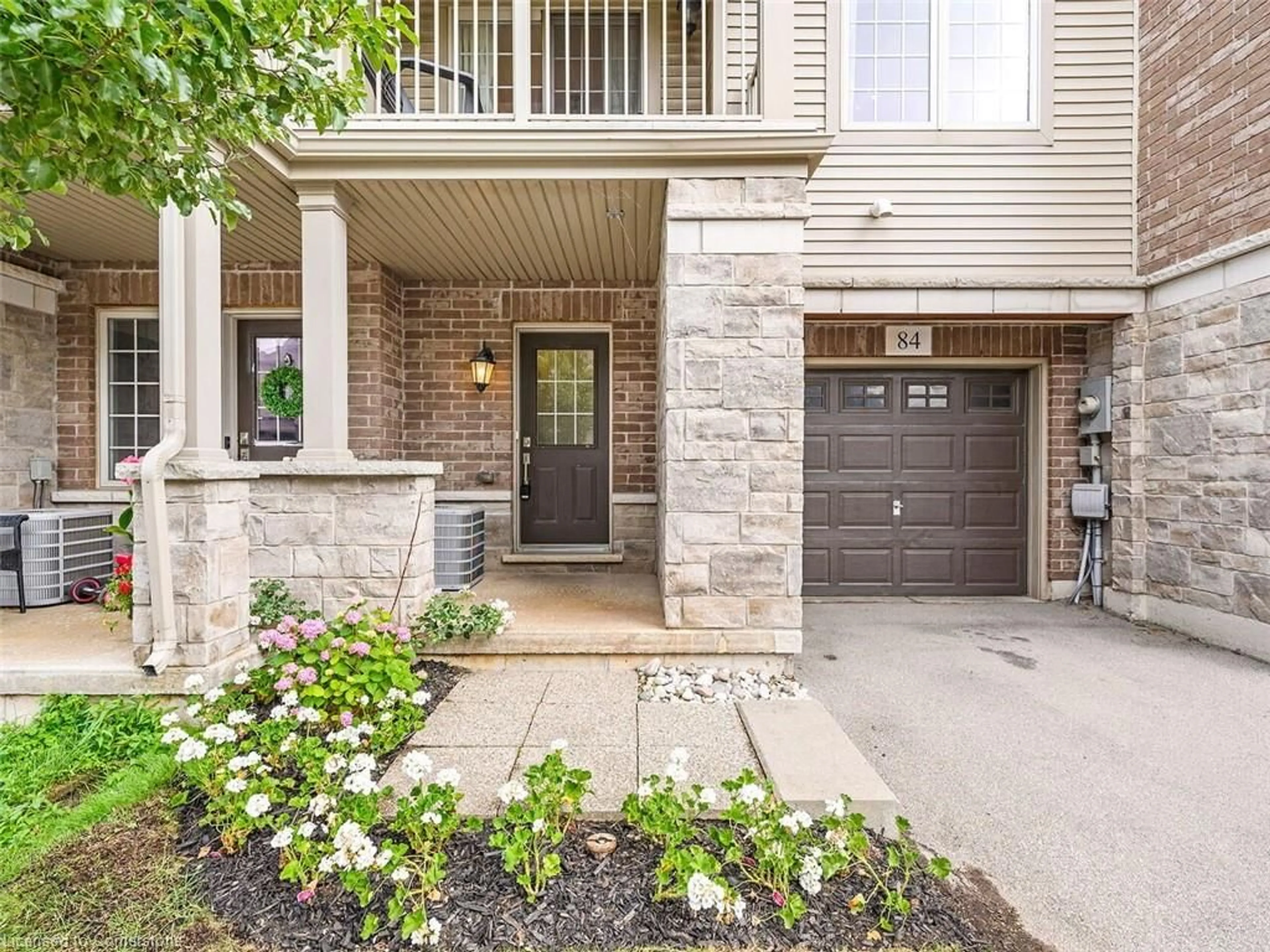Home with brick exterior material, street for 515 Winston Road Rd #84, Grimsby Ontario L3M 0C8