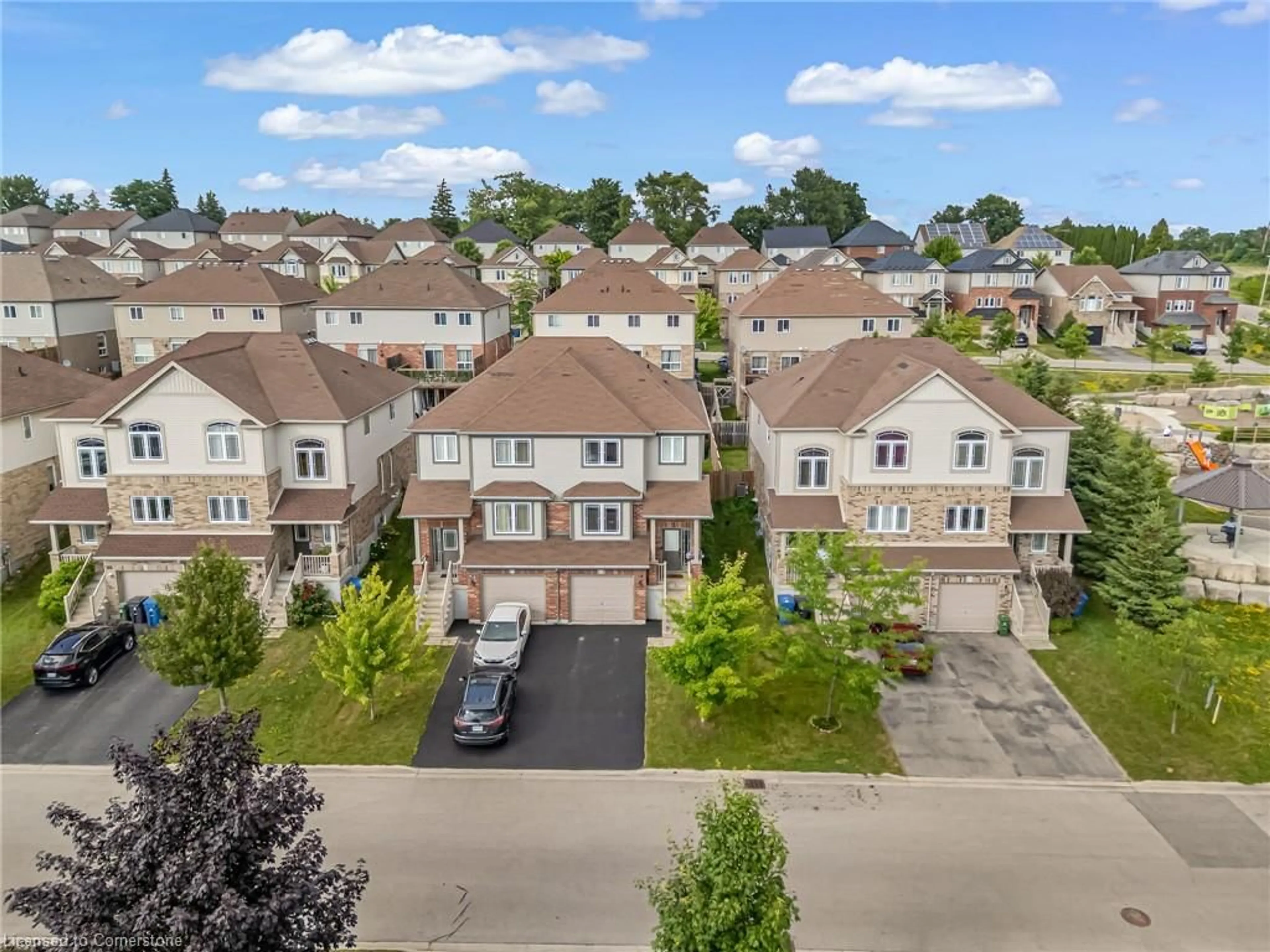 A pic from outside/outdoor area/front of a property/back of a property/a pic from drone, street for 19 Oakes Cres, Guelph Ontario N1E 7K3