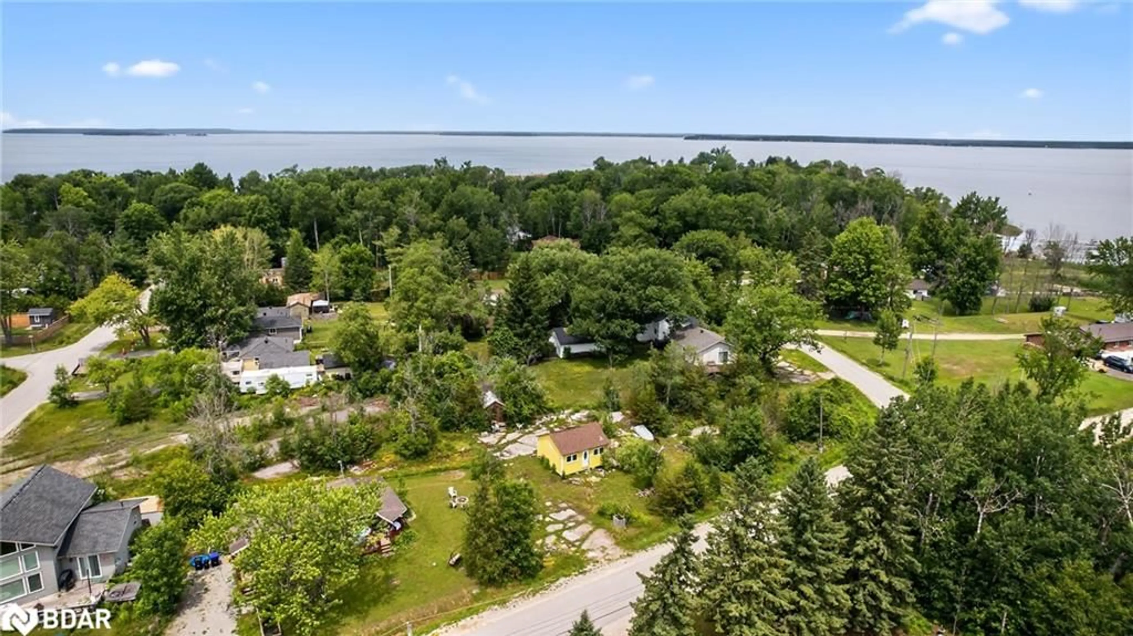 A pic from outside/outdoor area/front of a property/back of a property/a pic from drone, water/lake/river/ocean view for 178 Woodlands Ave, Port McNicoll Ontario L0K 1R0