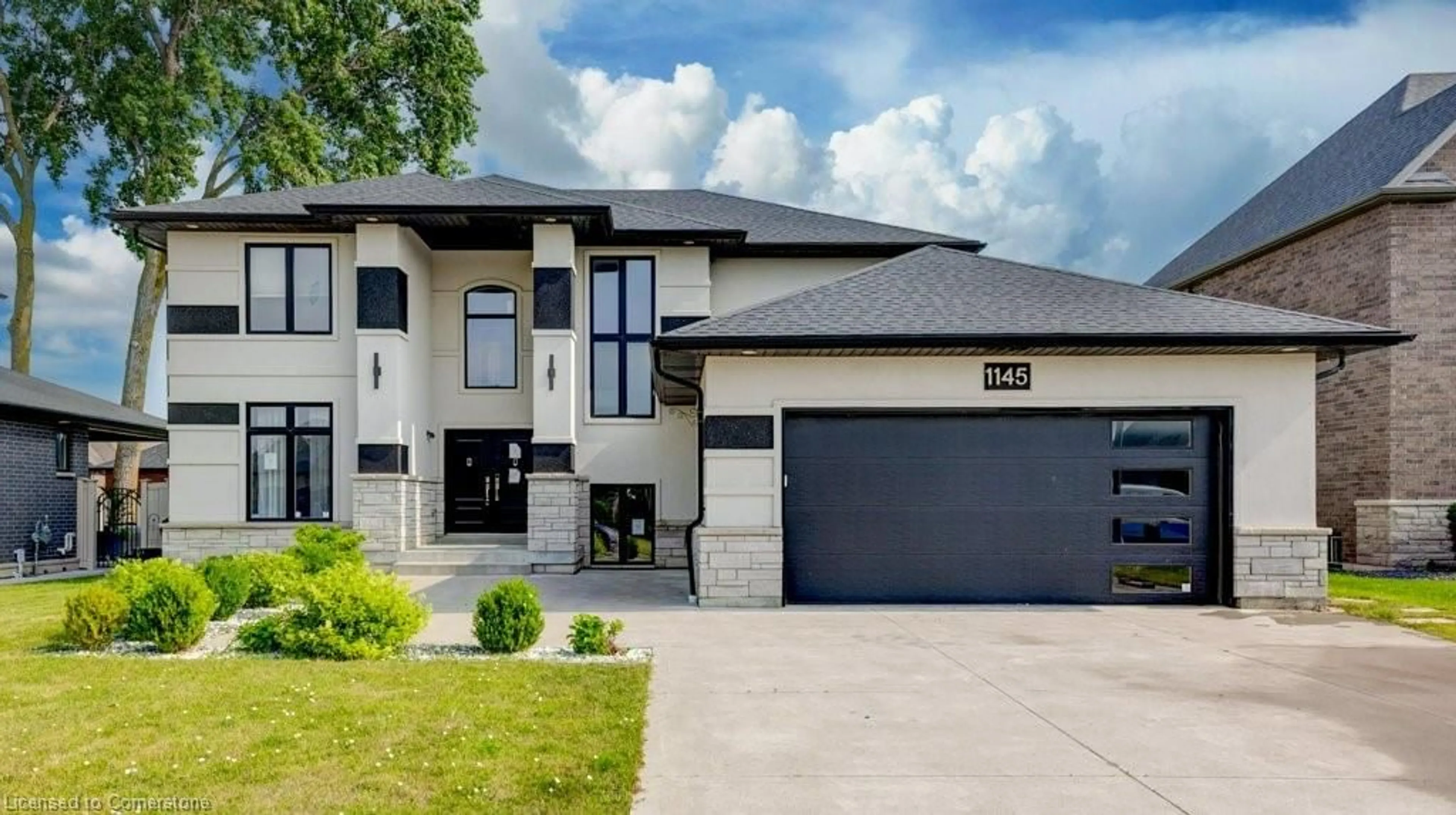 Home with brick exterior material, street for 1145 Regency Cres, Belle River Ontario K6A 2R2