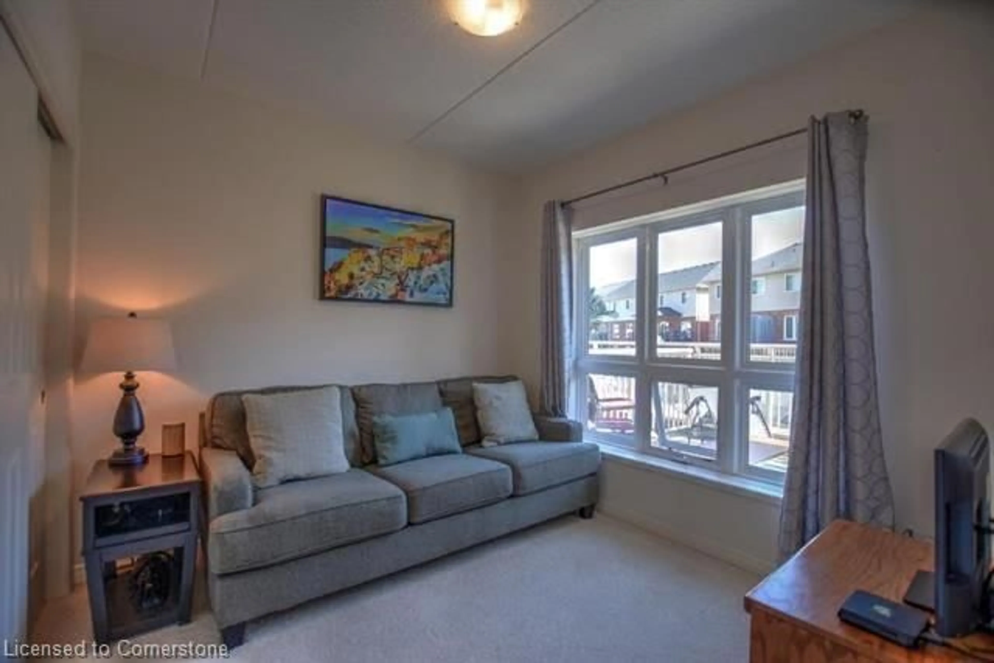 Living room with furniture, unknown for 155 Water St #206, Cambridge Ontario N1R 3E3