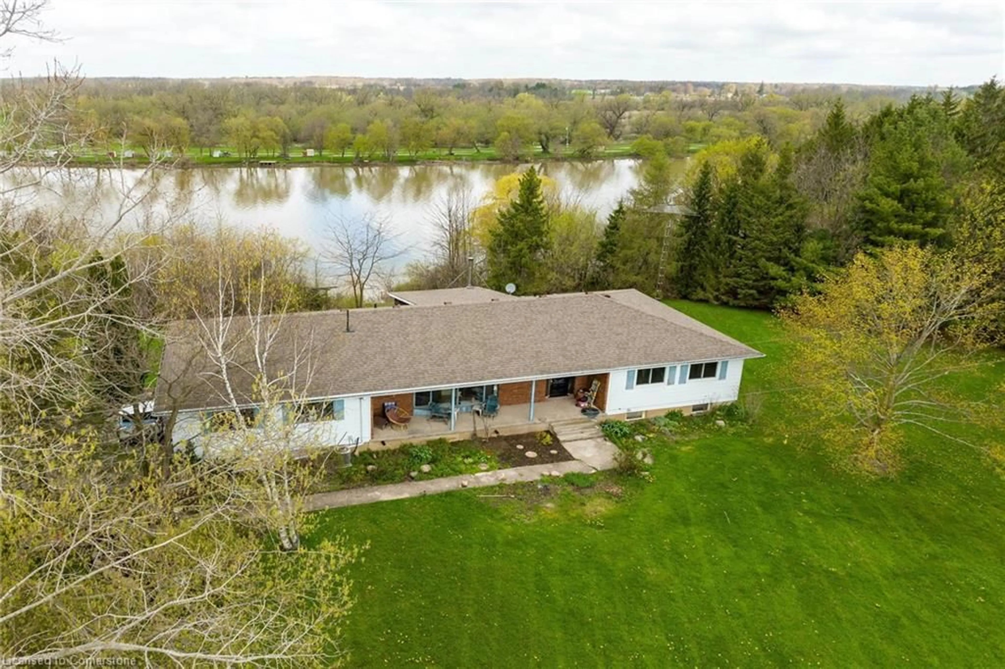 A pic from outside/outdoor area/front of a property/back of a property/a pic from drone, water/lake/river/ocean view for 304 River Rd, Haldimand County Ontario N1A 2W3
