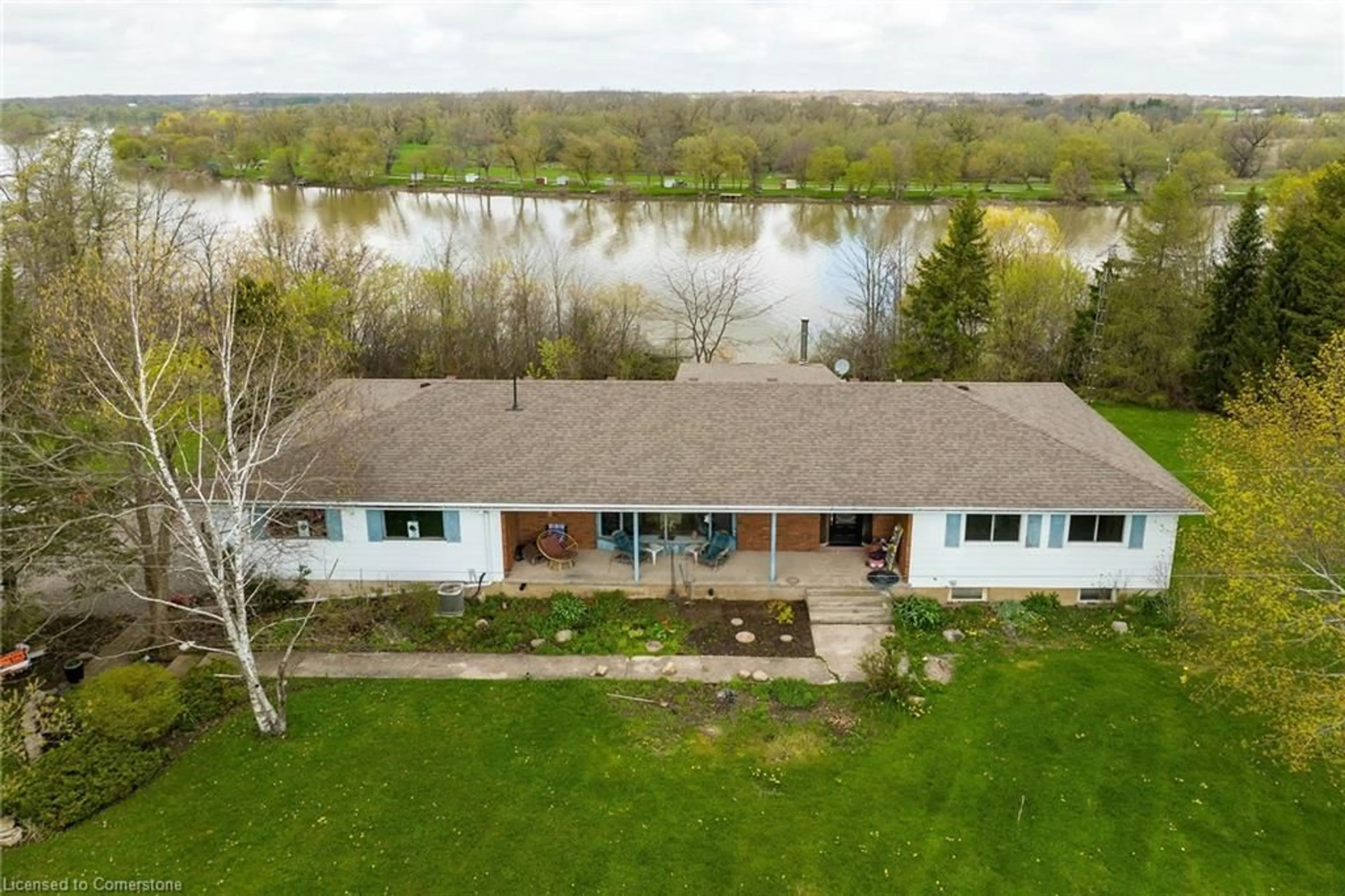 A pic from outside/outdoor area/front of a property/back of a property/a pic from drone, water/lake/river/ocean view for 304 River Rd, Haldimand County Ontario N1A 2W3
