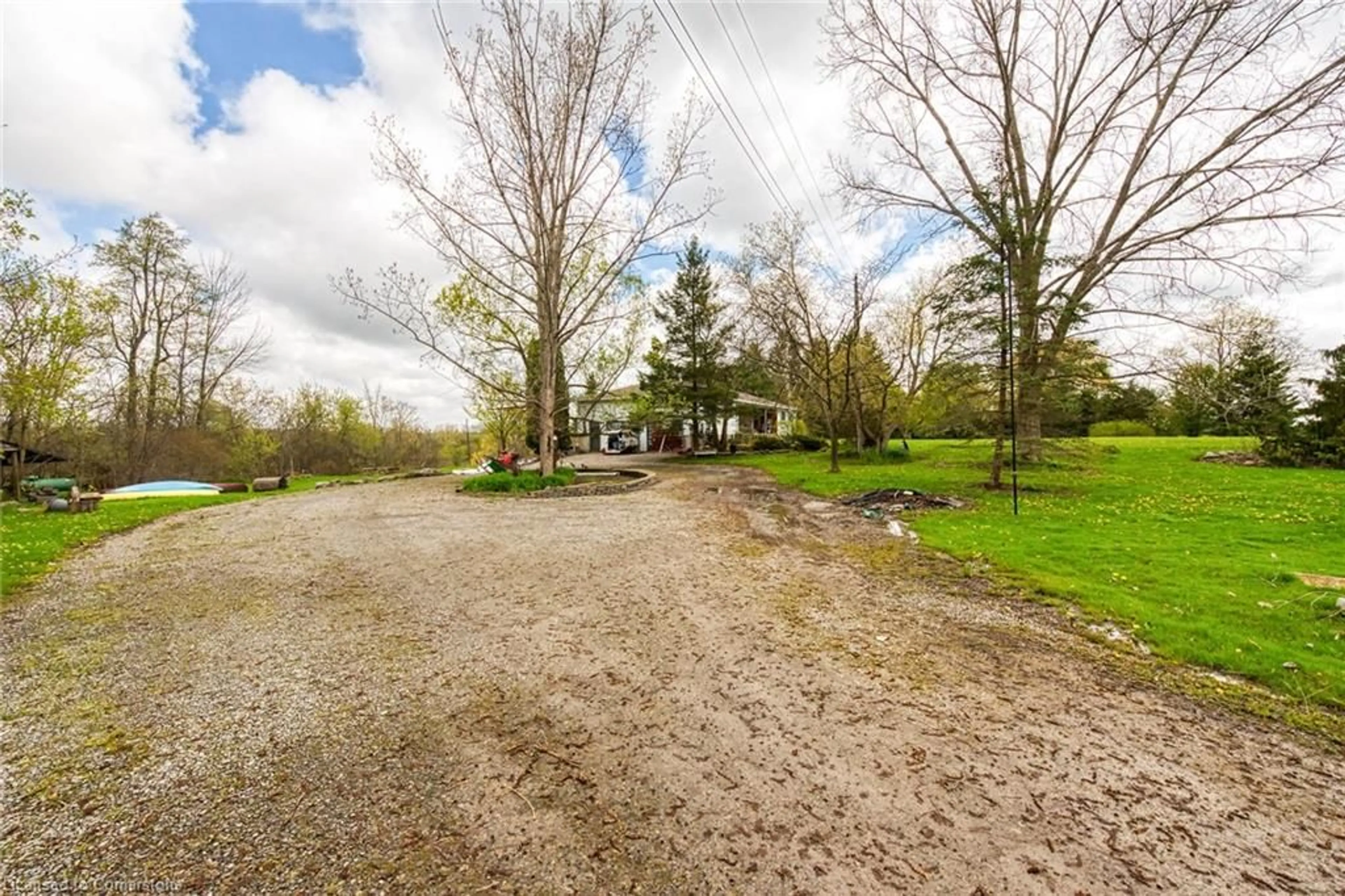 A pic from outside/outdoor area/front of a property/back of a property/a pic from drone, street for 304 River Rd, Haldimand County Ontario N1A 2W3